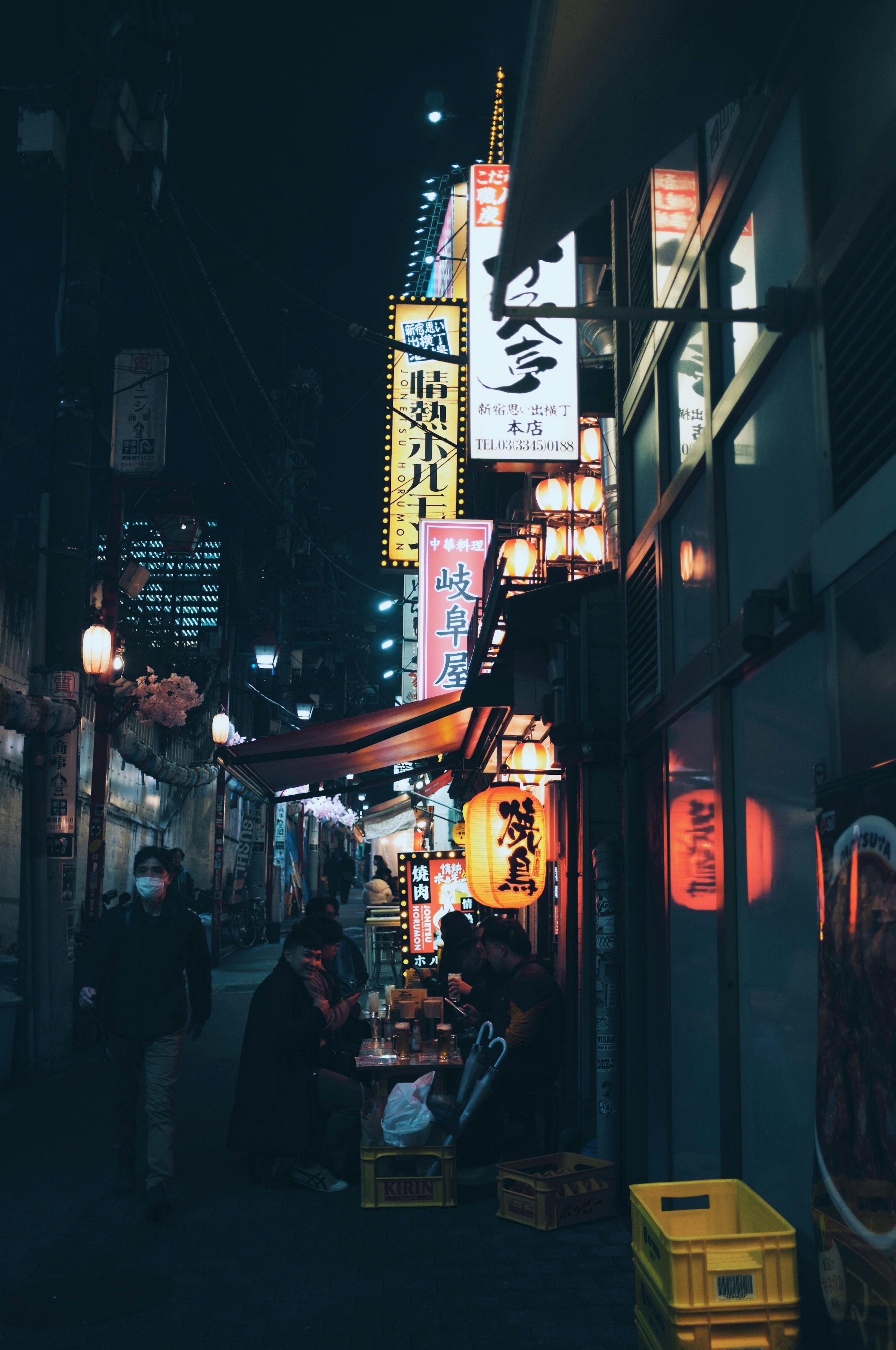3000x4517 Nighttime scene of a japanese street with lights. photo