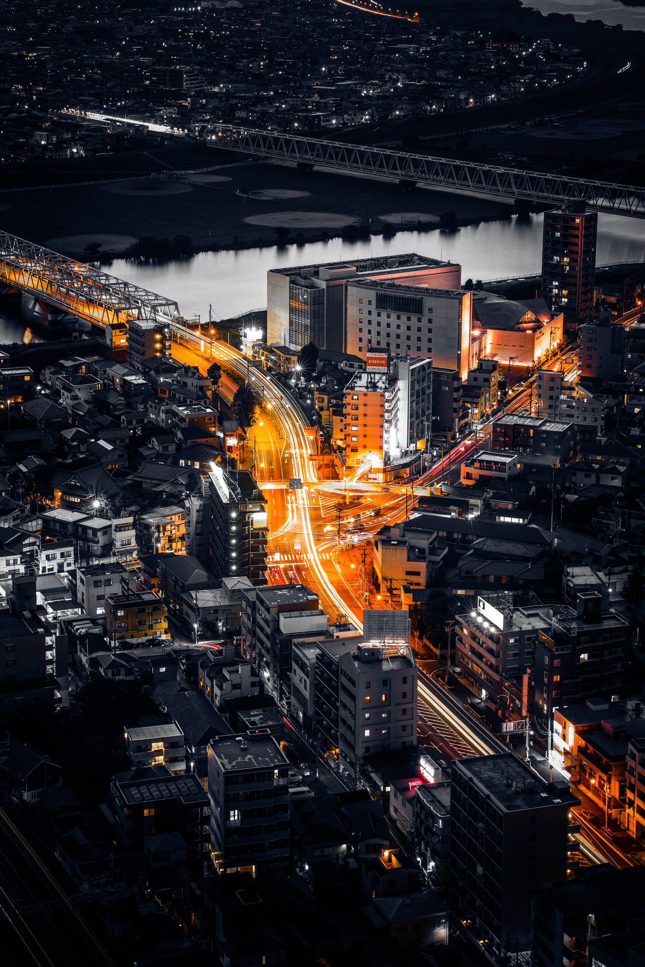 1280x1920 Download Time Lapse View Of Tokyo's Bustling City Streets Wallpaper