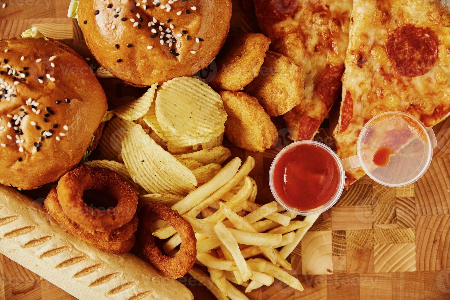 1468x980 Unhealthy and junk food. Different types of fast food on the table, closeup