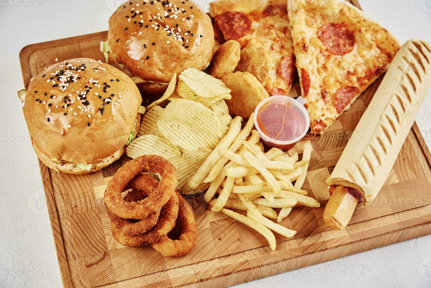 1468x980 Unhealthy and junk food. Different types of fast food on the table, closeup