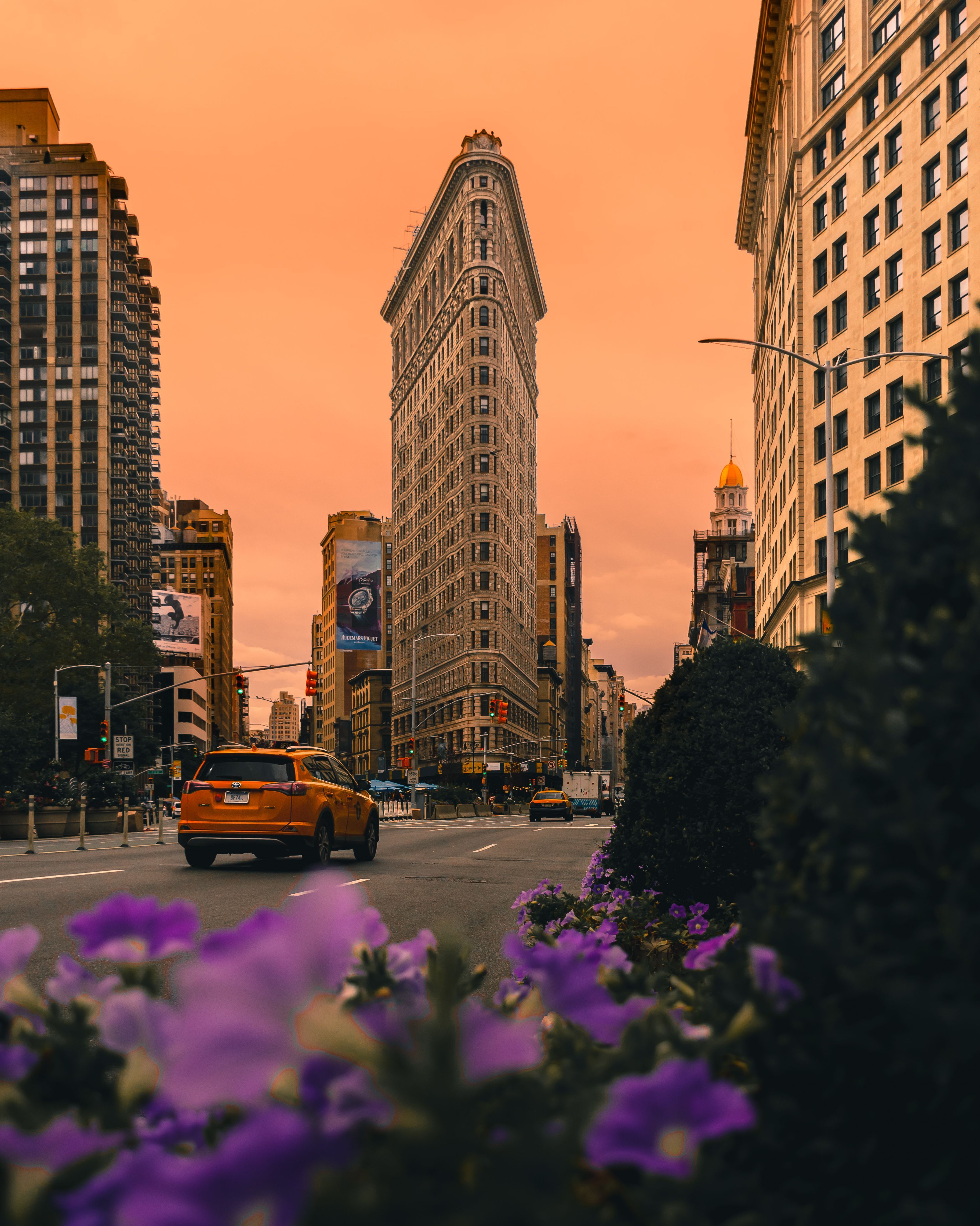3333x4166 Orange Vehicle on Road Near Buildings at Golden Hour · Free