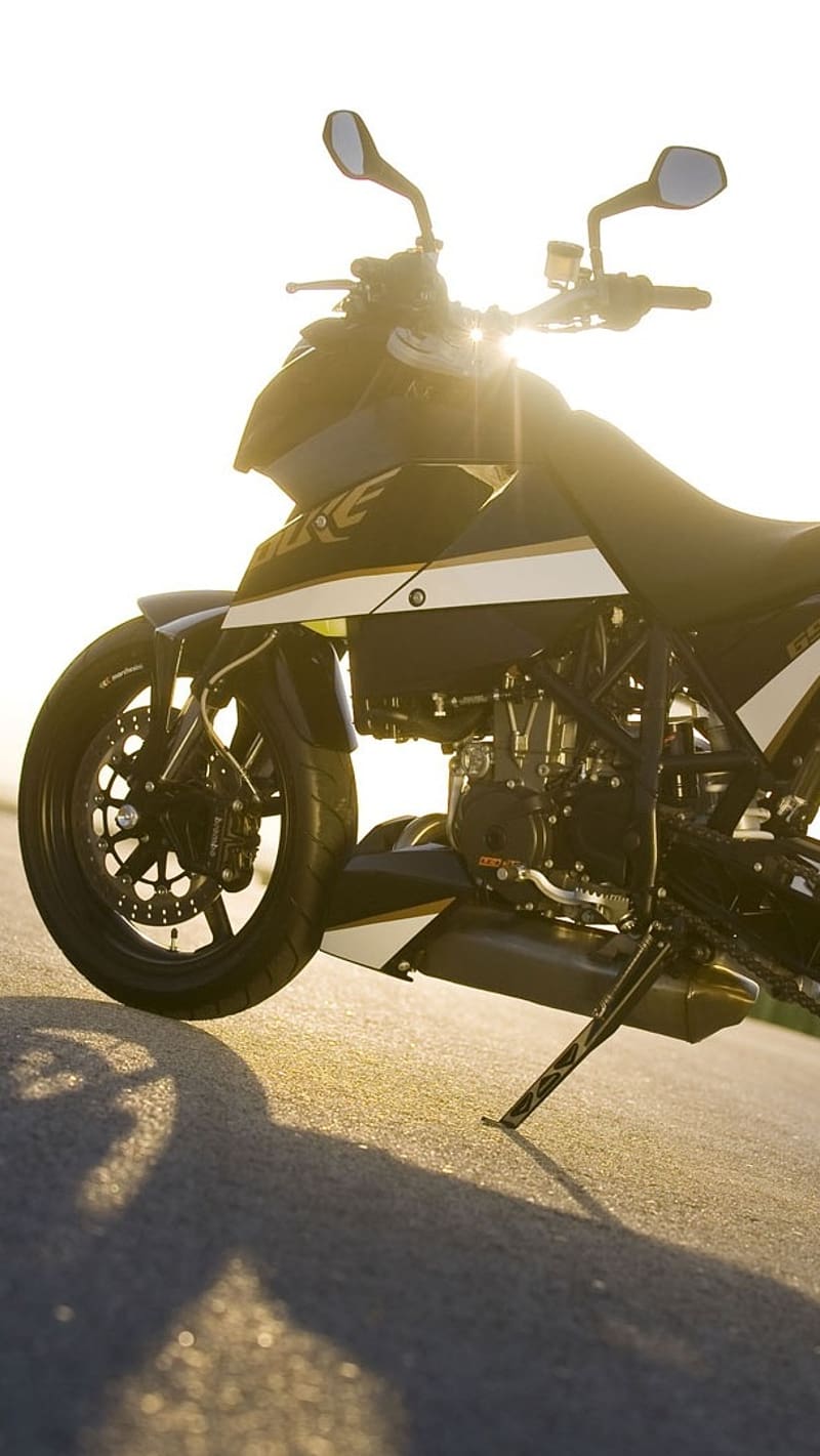 800x1421 Duke Ktm With Sun Rise Background, duke ktm, sun rise, background, bike, racing, HD phone wallpaper