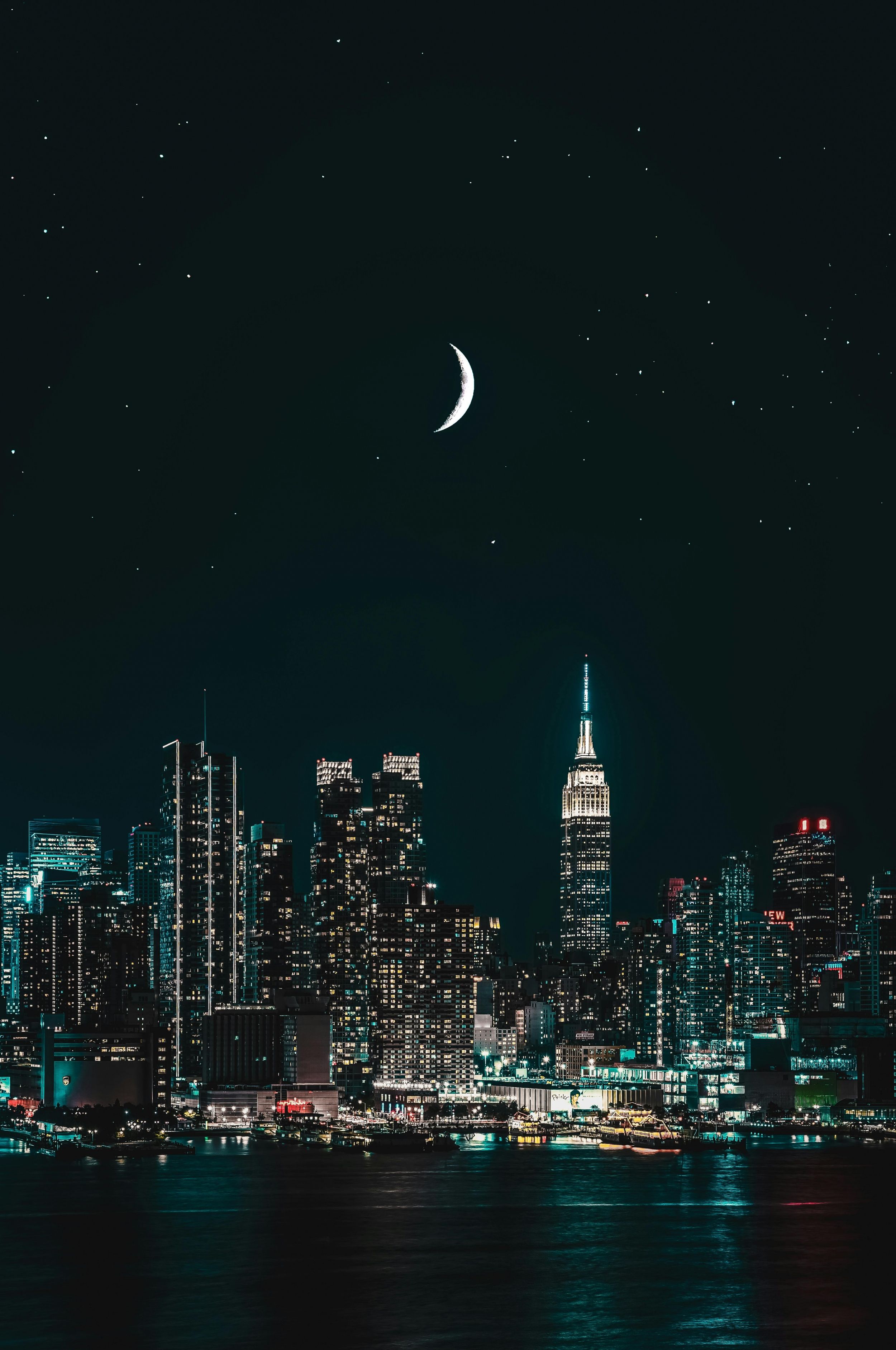 2500x3766 City Buildings At Night With Crescent Moon Stars