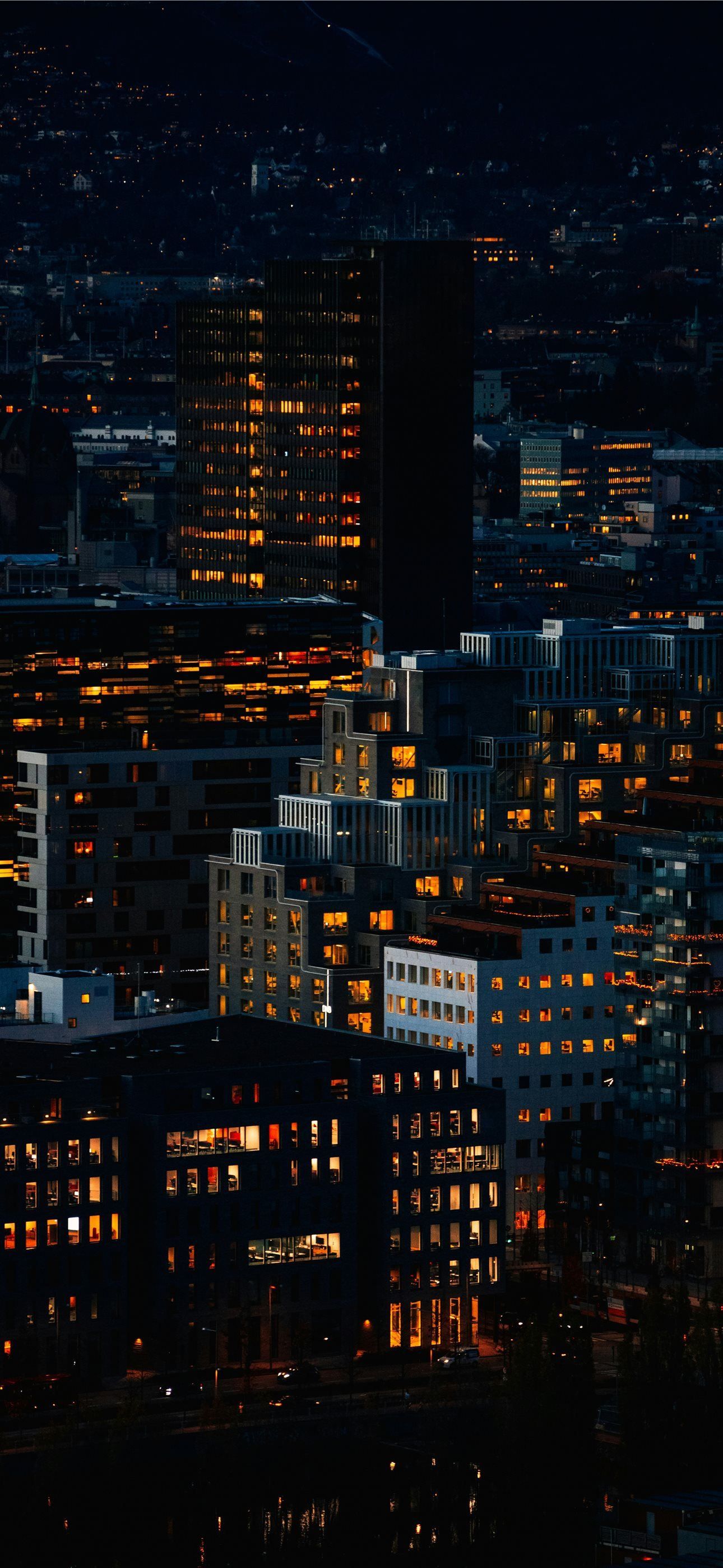 1290x2796 high rise buildings during night time iPhone Wallpaper Free Download