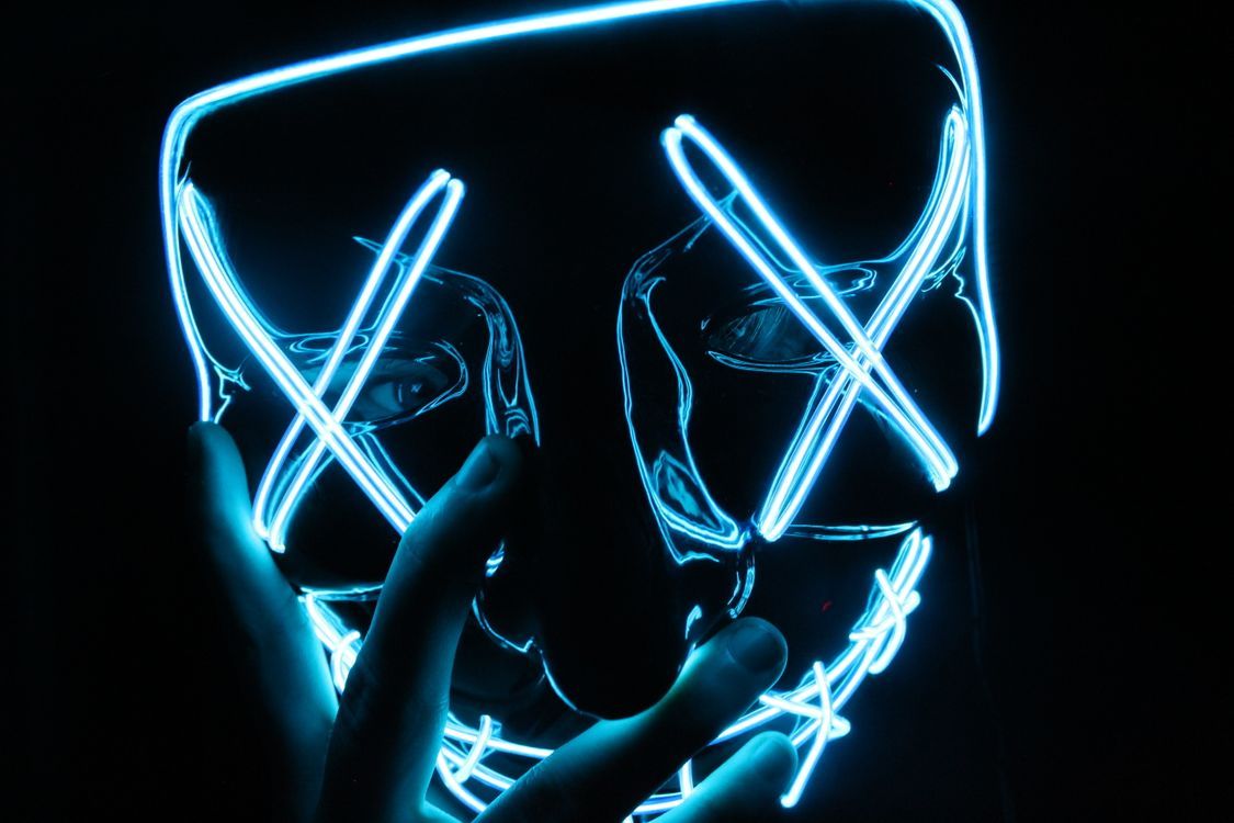 1125x750 Person Wearing Lighted Blue Led Mask · Free