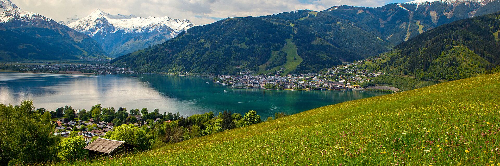 1920x640 Hotel right by the lake am See / Austria