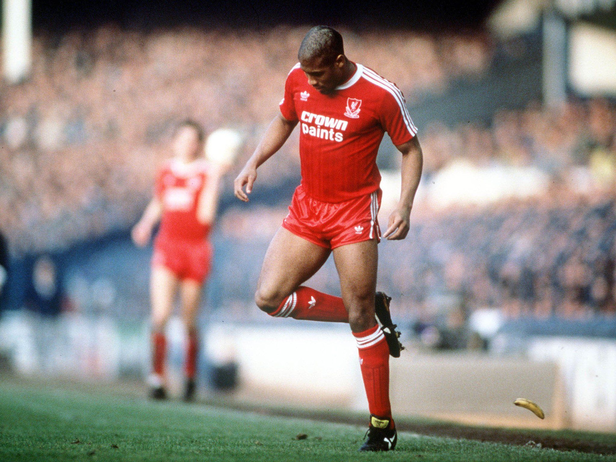 2048x1536 One of the most iconic photo's in football. During a Merseyside Derby in John Barnes backheels a banana that was thrown at him during the game