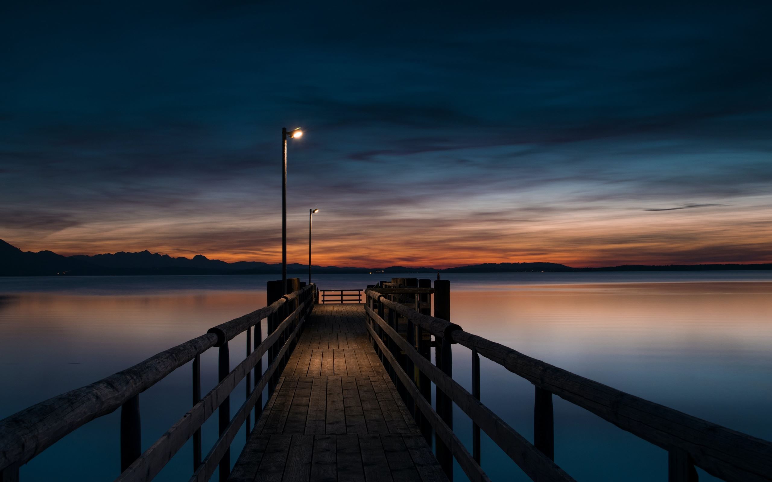 2560x1600 lamp post turned on at brown wooden dock MacBook Air Wallpaper Download