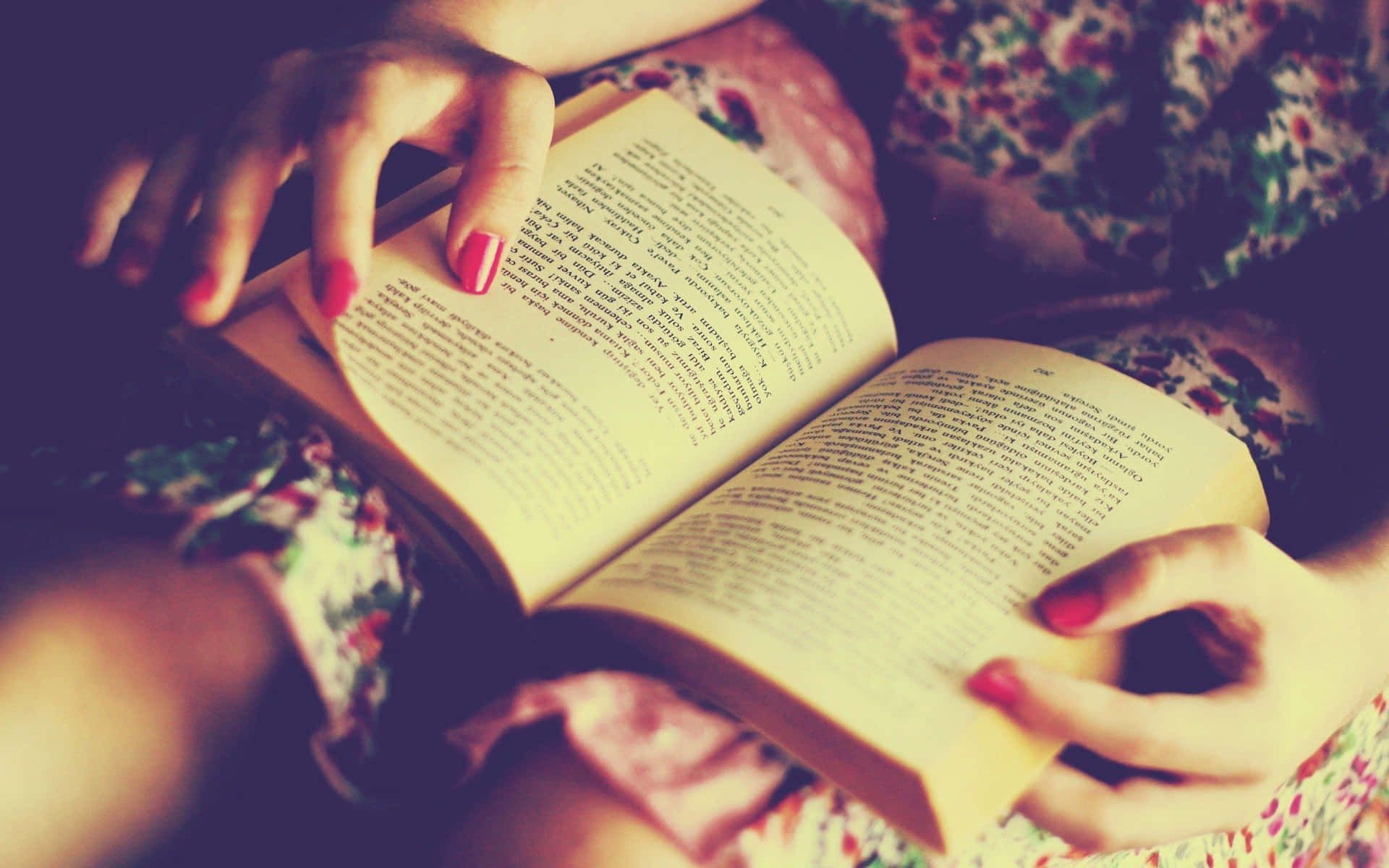 1920x1200 Download a woman is holding an open book Background