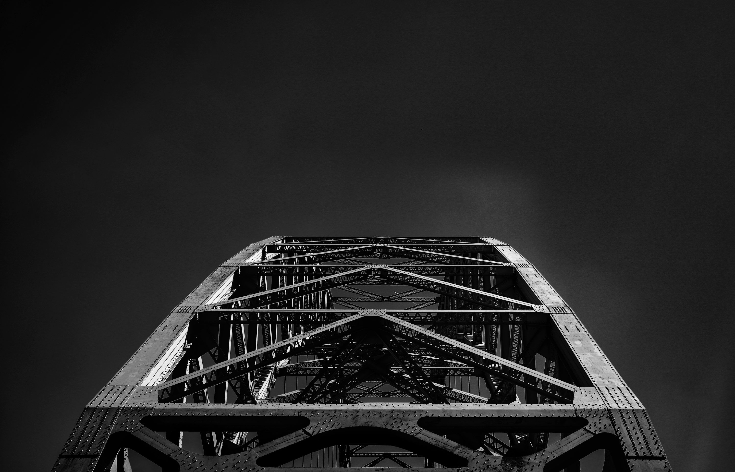 3000x1927 A black and white photo of the top of a bridge photo