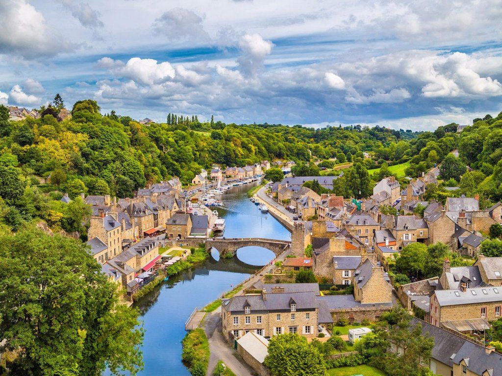 1024x768 Dinan Is A Pictureque Walled Town In Brittany France That Overlooks The Rance River Grab A Crepe And Admire The Towns Ramparts Half Timbered Houses And Quaint Streets Filled W + Nomads