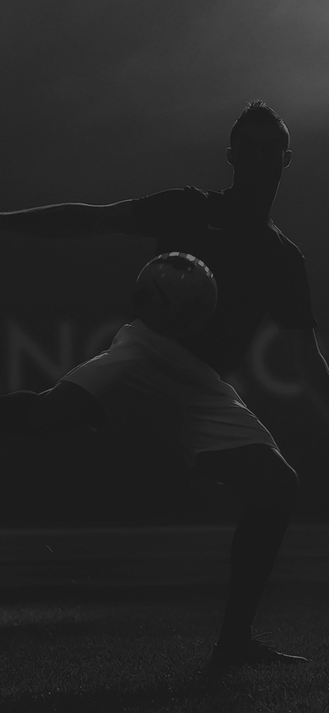 1125x2436 Christiano Ronaldo In Dark Sports Face iPhone 6 Plus Wallpaper
