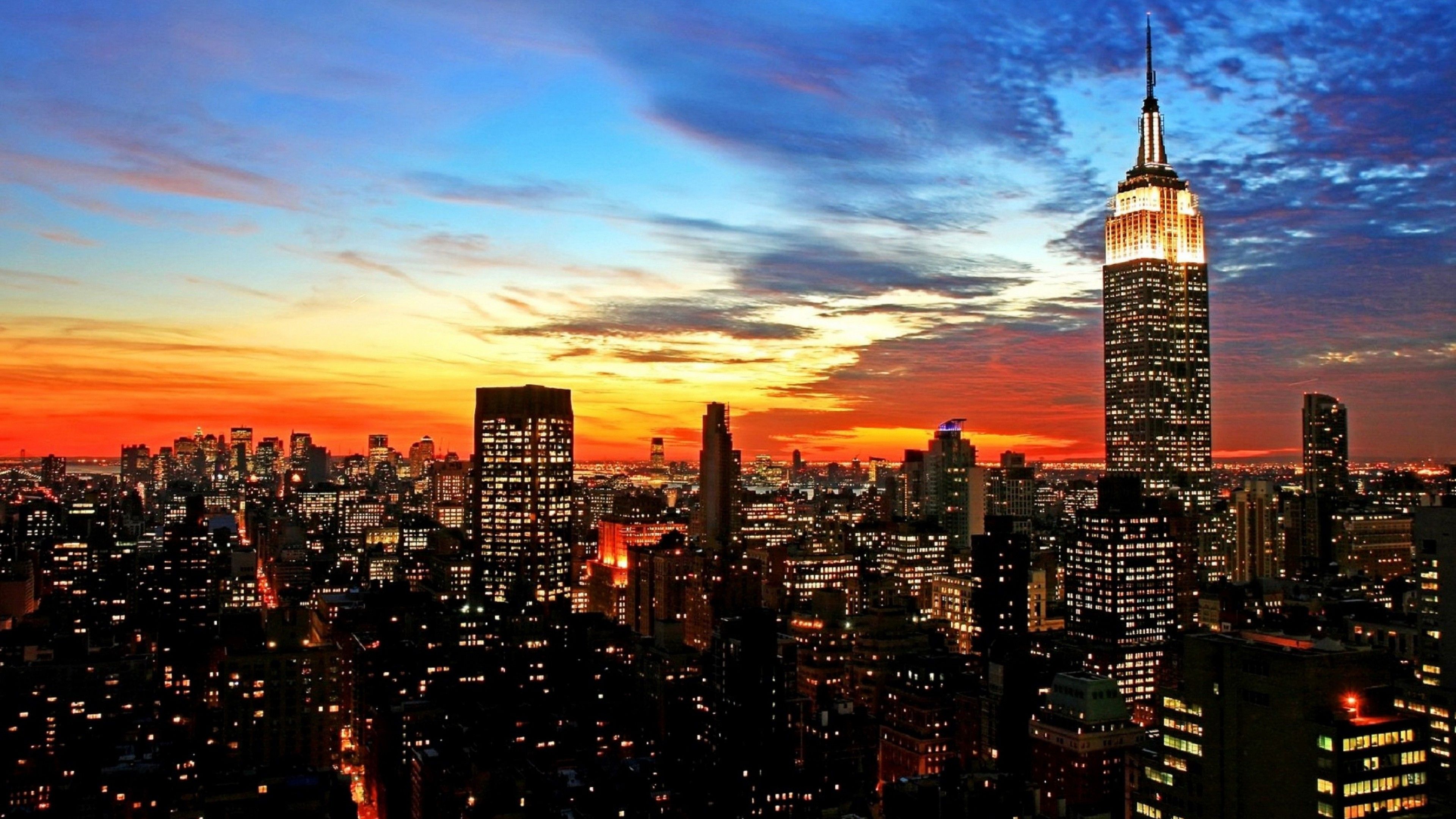 3840x2160 City Manhattan With Background Of Blue And Yellow Sky During Sunset 4K HD New York Wallpaper
