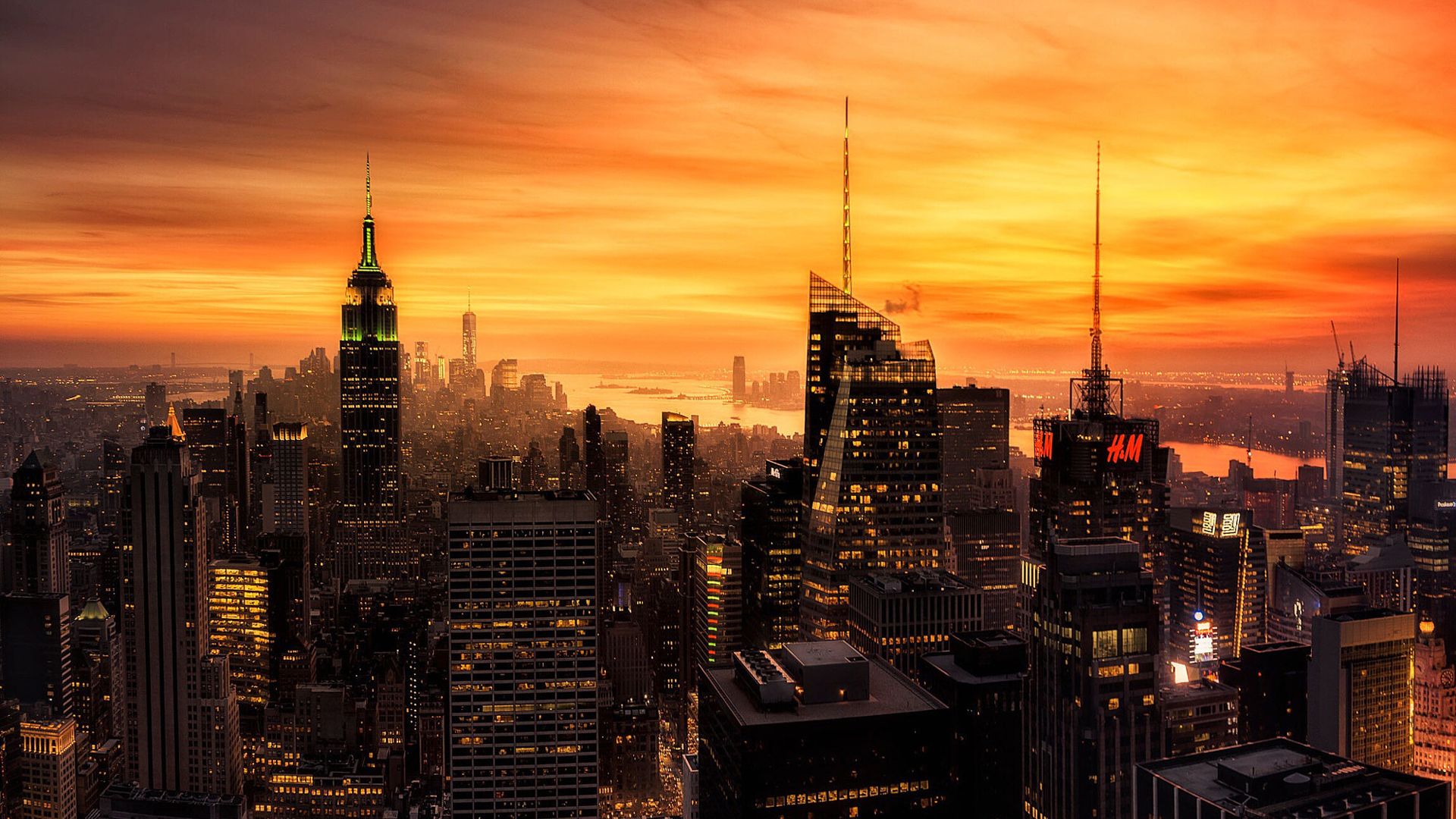 1920x1080 City With High Rising Buildings Under Yellow Sky During Sunset HD New York Wallpaper