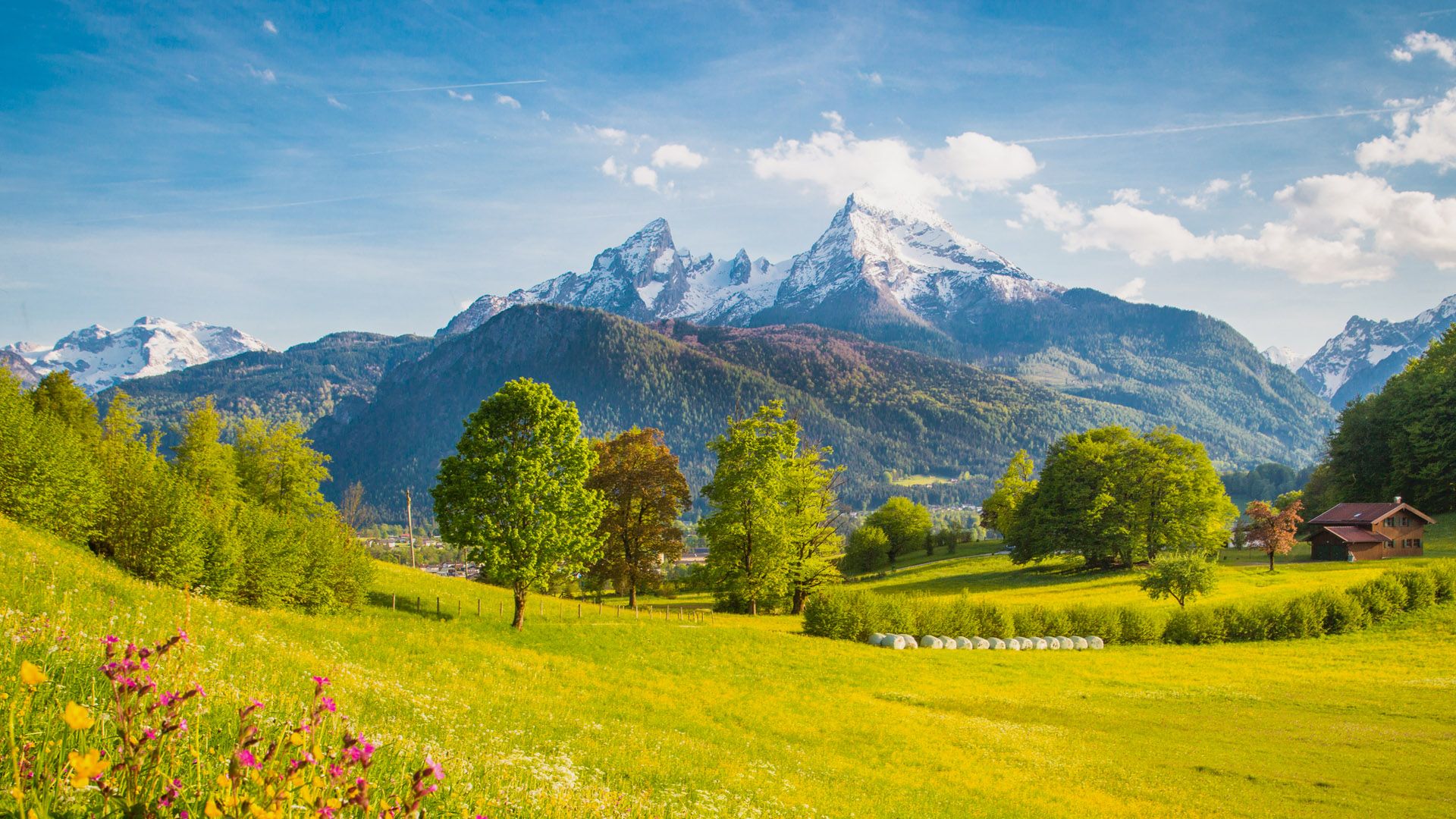 1920x1080 Alpine mountain scenery with meadows and peaks on a sunny day in springtime, Bavaria, Germany. Windows Spotlight Image