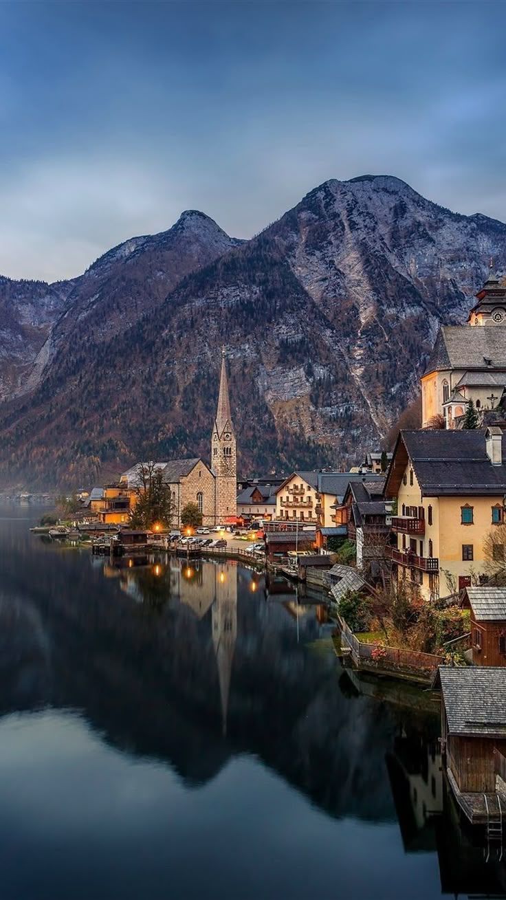 736x1309 Hallstatt, Austria: A Pictureque Alpine Town. Beautiful mountain towns, Alpine village wallpaper, Winter mountain town