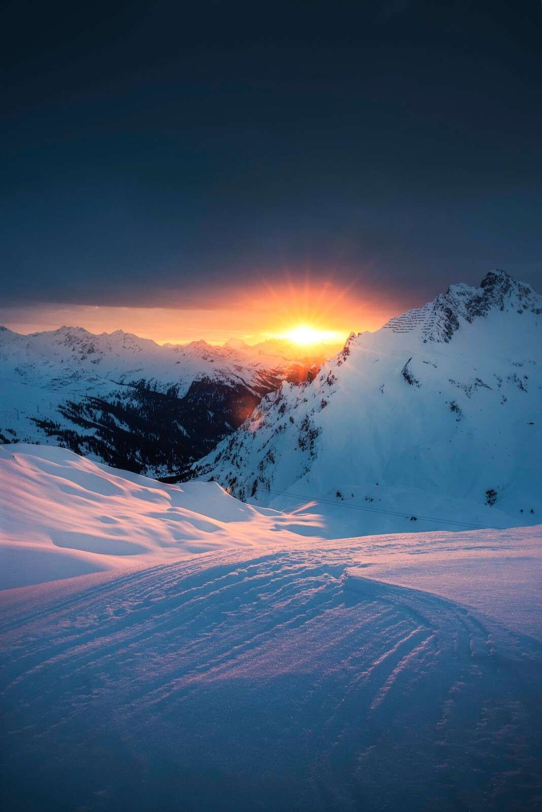 1068x1600 Wallpaper Mural Sun Above Snow Covered Alpine Peaks