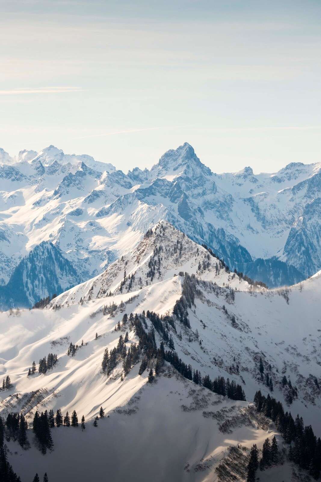 1067x1600 Wallpaper Mural comb with alpine peaks in sunlight