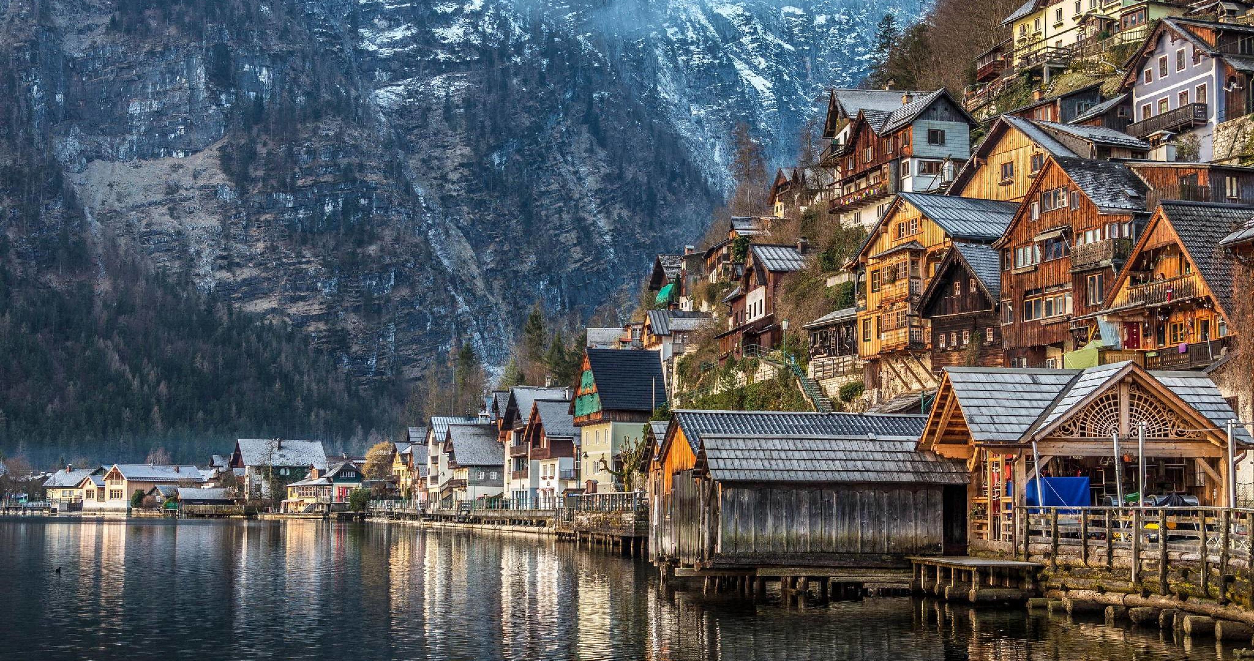 4096x2160 Wallpaper Brown and White Houses Beside River During Daytime, Background Free Image