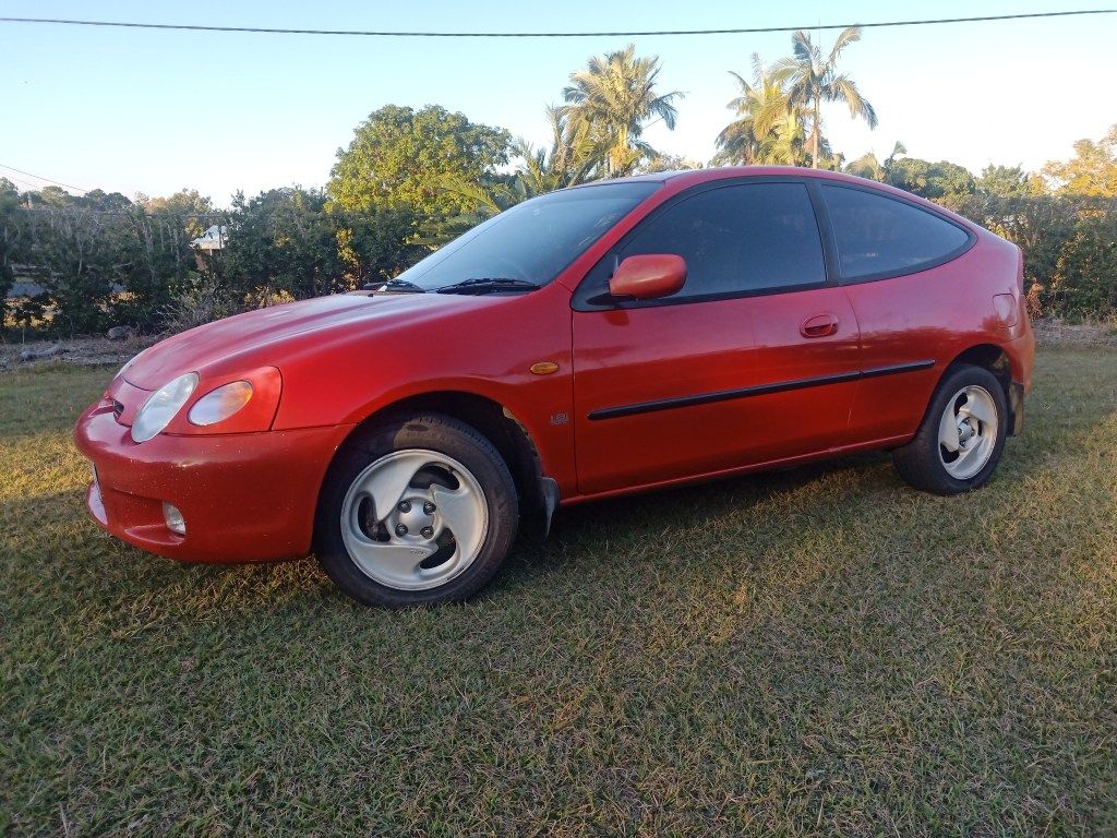 1024x768 Lynx Was One Cool Cat: Ford Laser Mazda 323C. Classic And Clunker