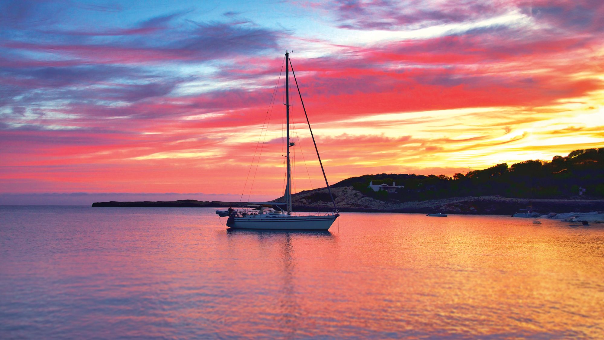 2000x1125 Zhik Spirit of Adventure: 'Dramatic scenery, sheltered anchorages and fine beaches make cruising spectacular in the Balearics'