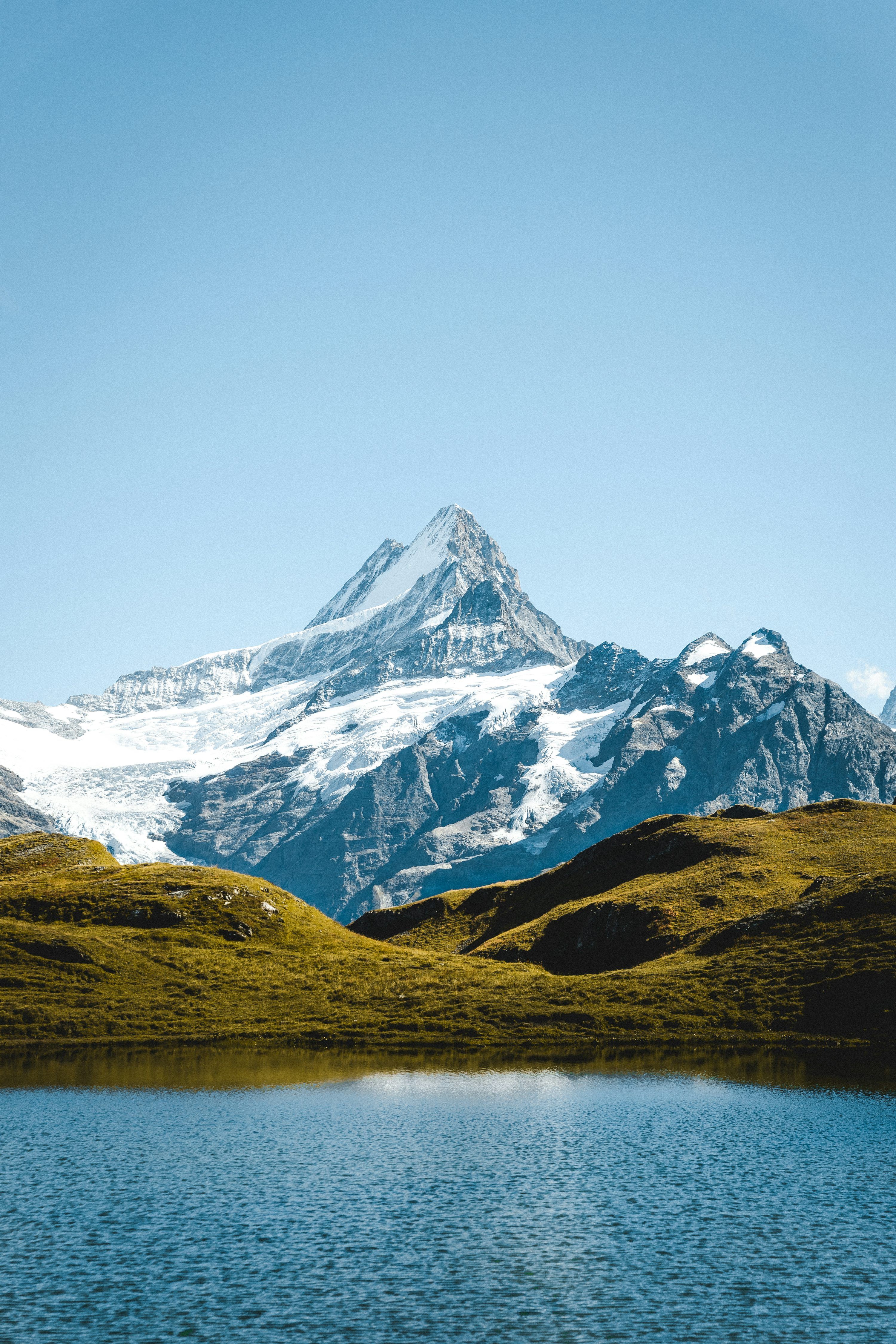 3000x4500 Snow Capped Mountain Peak Reflected In A Calm Lake. Photo