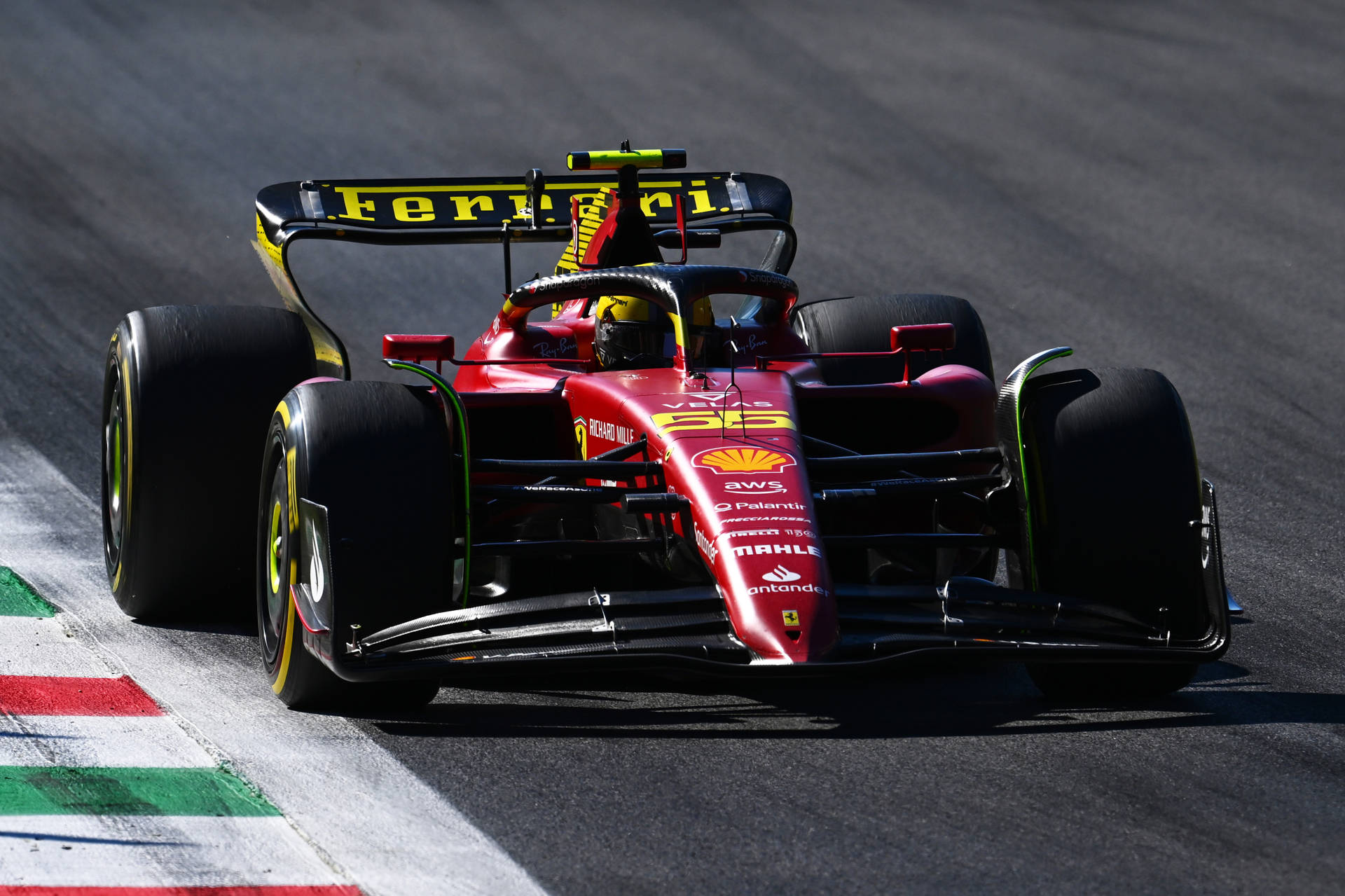 1920x1279 Download Carlos Sainz Jr in his blazing red Ferrari at a Grand Prix Wallpaper
