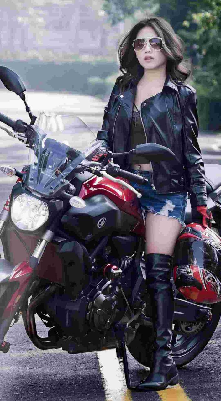 705x1280 Biker girl wallpaper