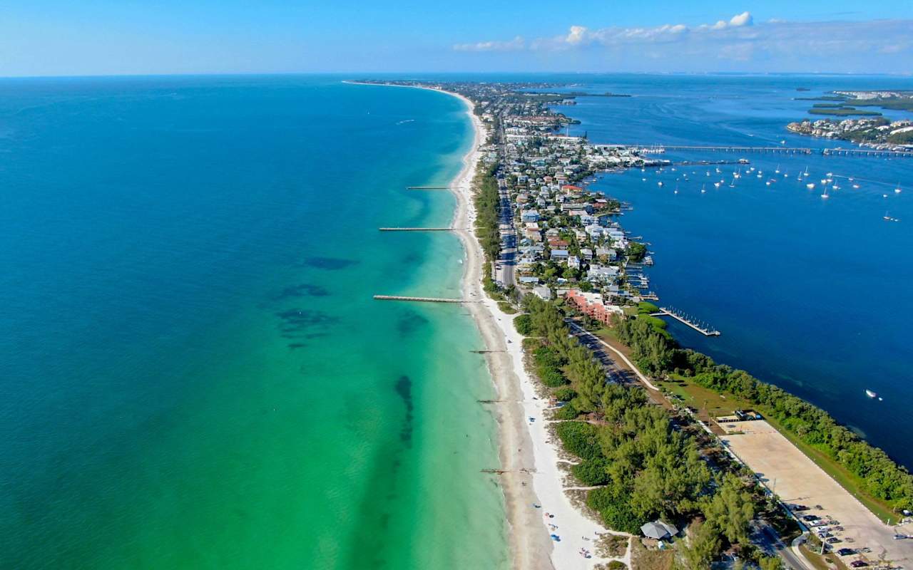 1280x800 Helicopter Tours: A Bird's Eye View of Anna Maria Island's Breathtaking Scenery. Blog. The Hannah Hillyard Group