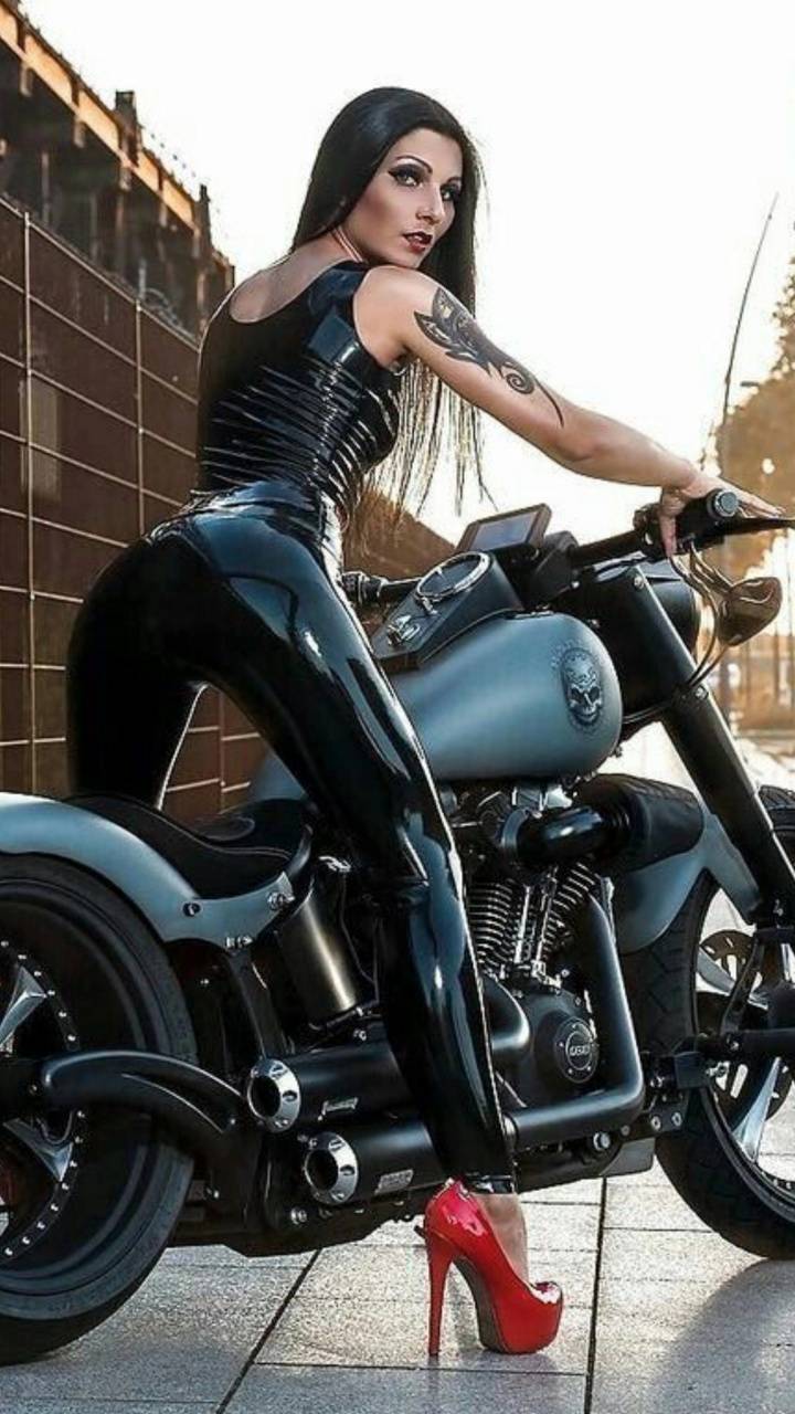720x1280 Female biker wallpaper
