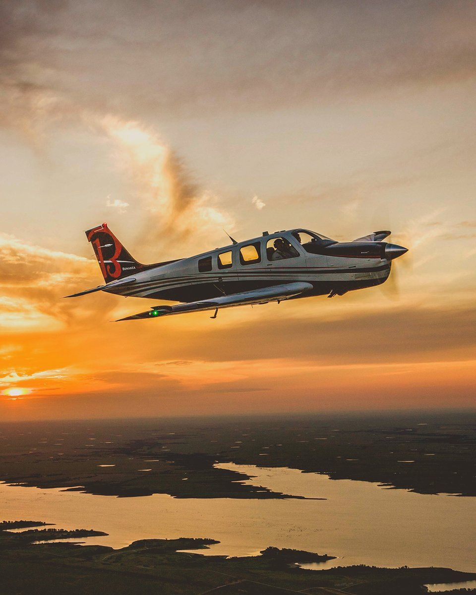 960x1200 What's more beautiful than a sunset? A Bonanza, of course