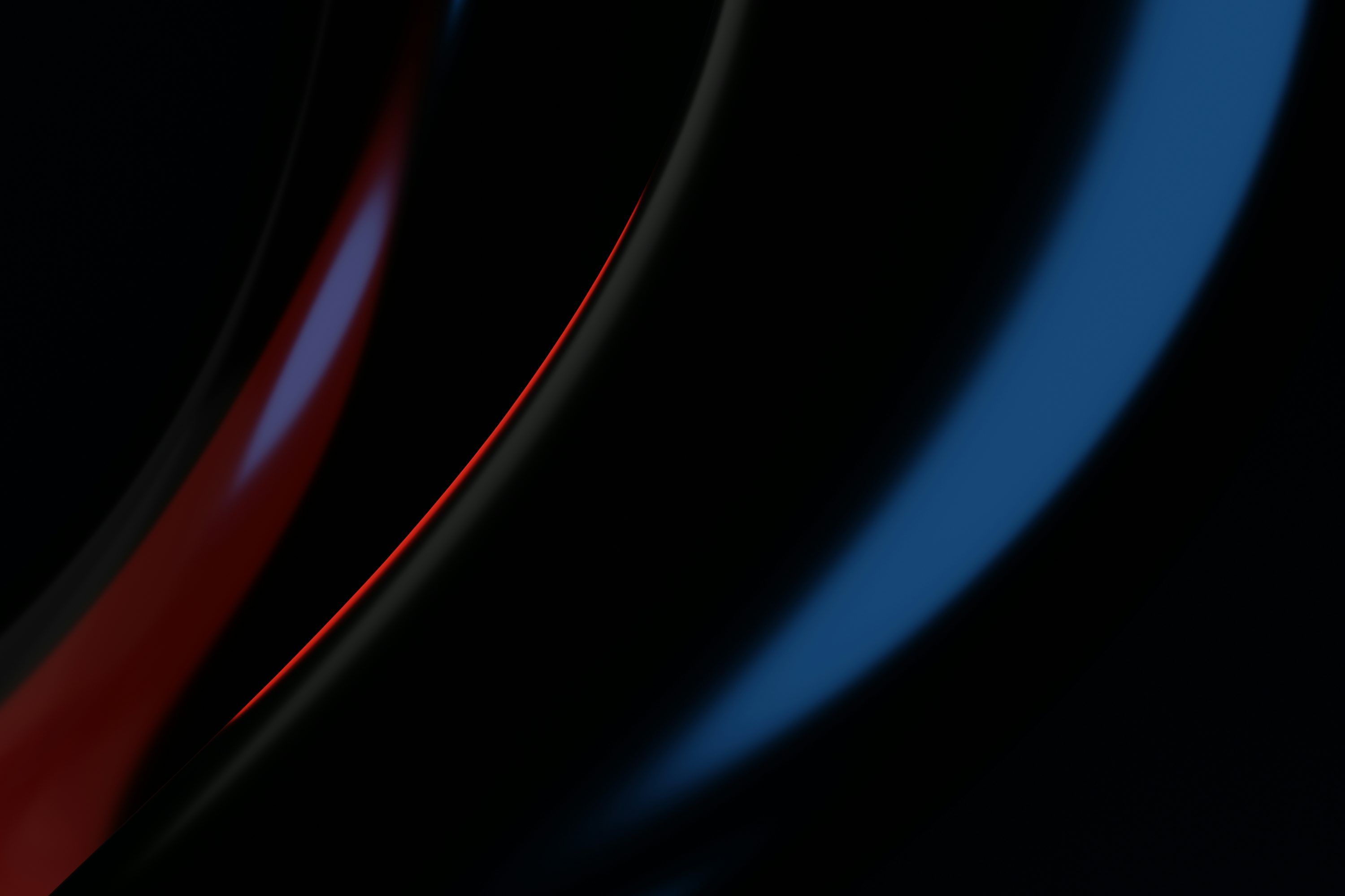 3000x2000 A close up of a black and red object photo