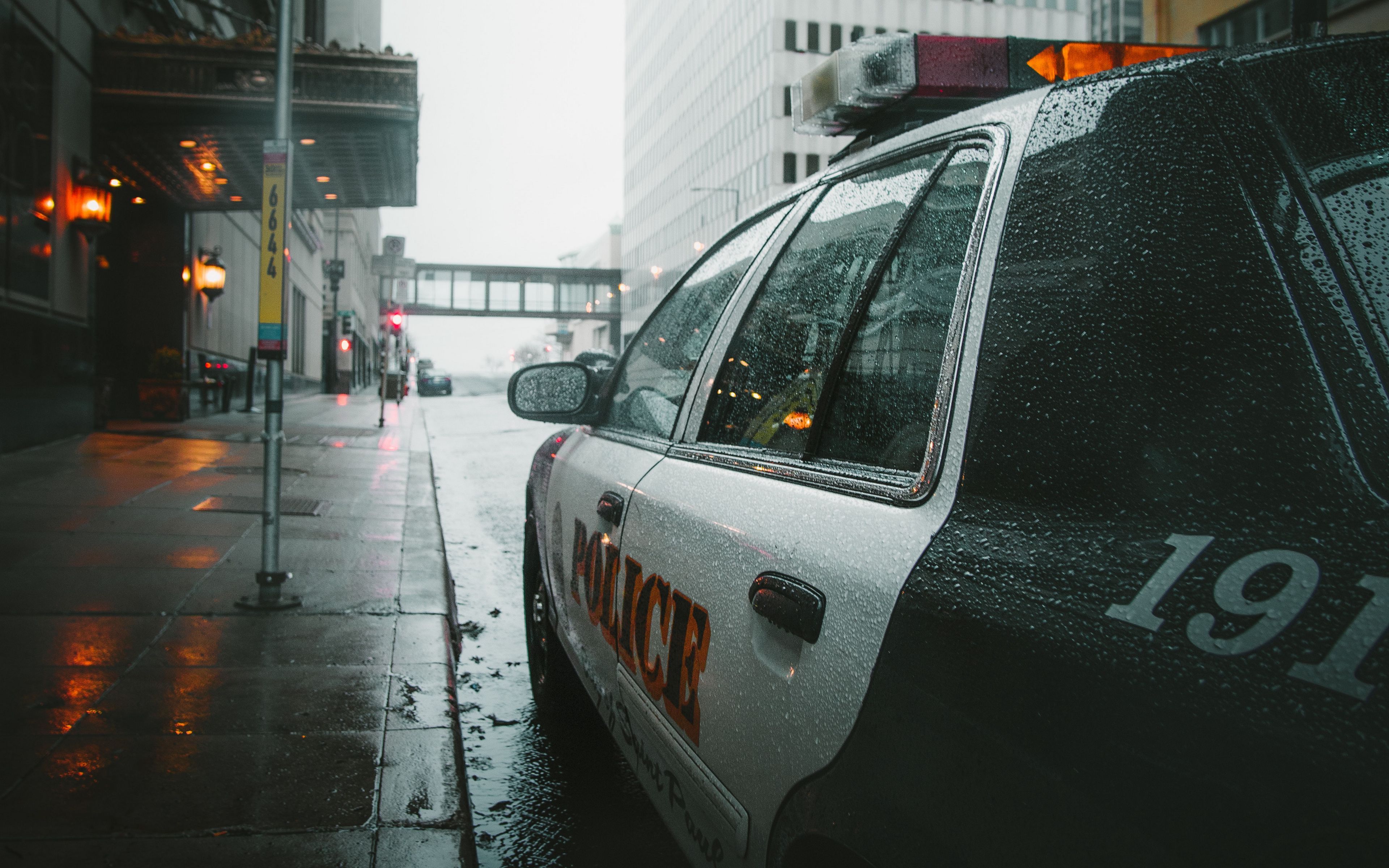 3840x2400 Download wallpaper 3840x2400 police, car, street, city, rain 4k ultra HD 16:10 HD background