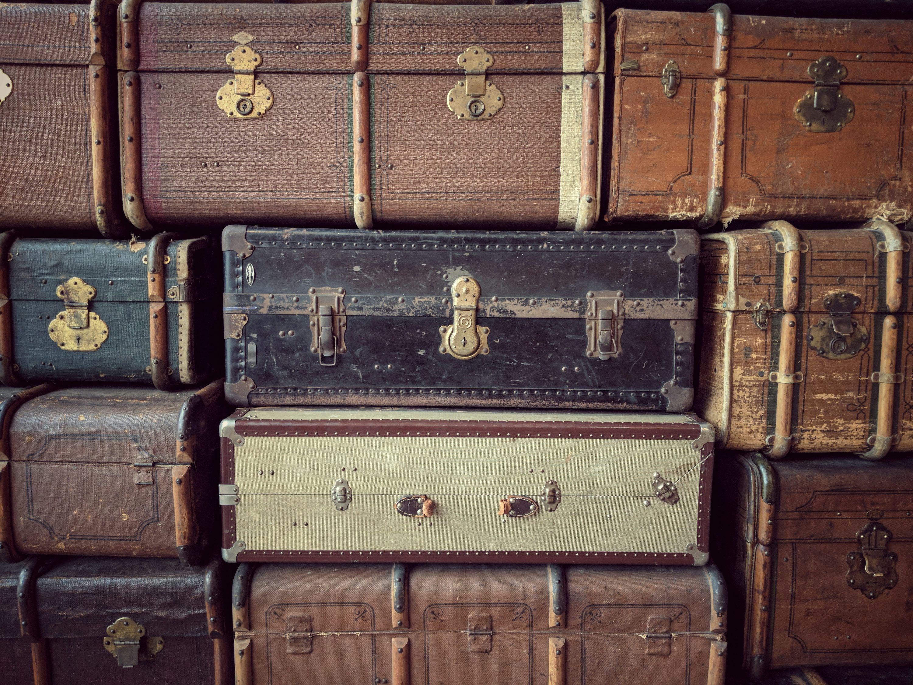 3000x2250 Pile of brown suitcase lot photo