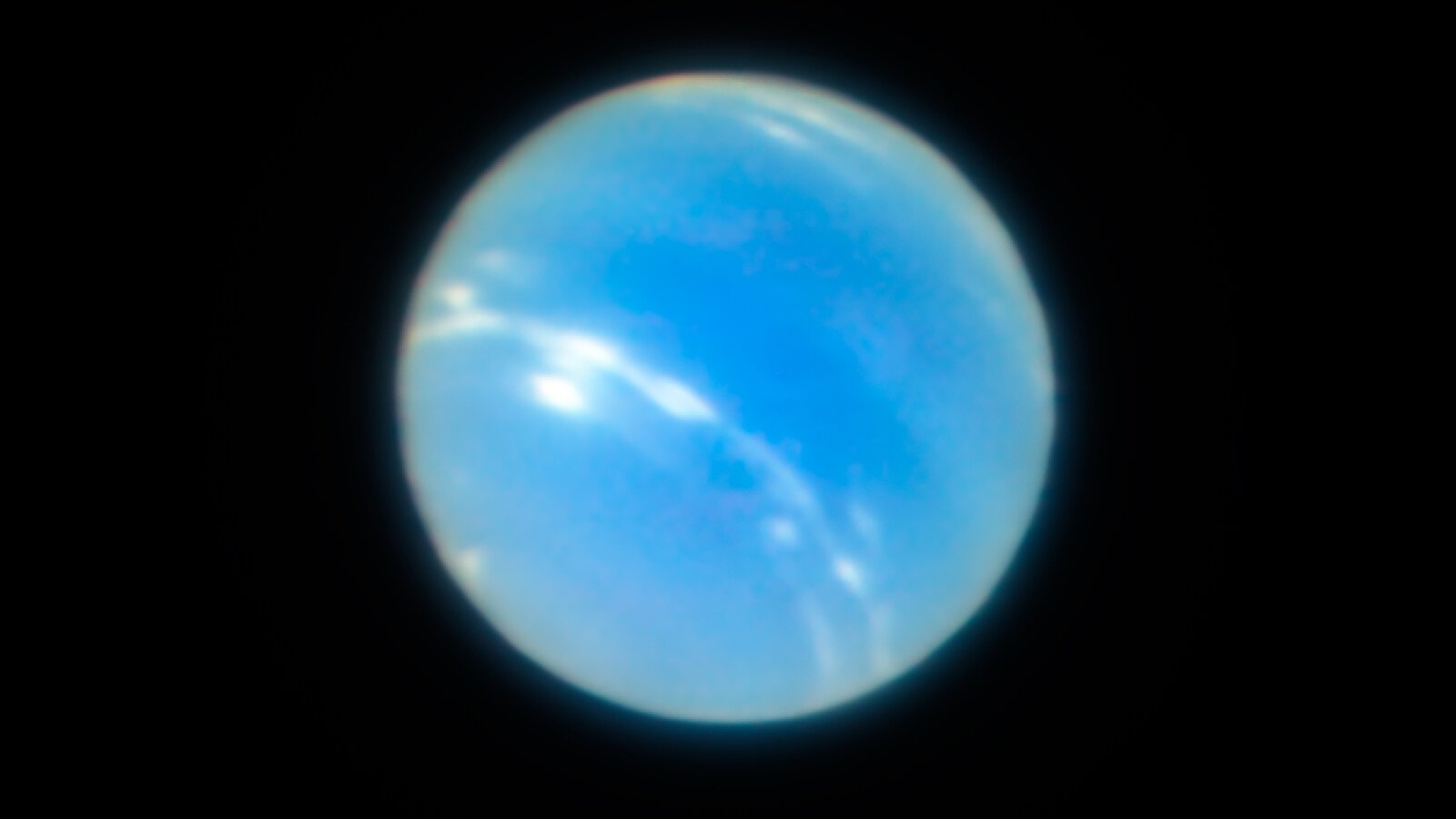 1600x900 This Moon Of Neptune Might Have Survived A Wrecking Ball Event