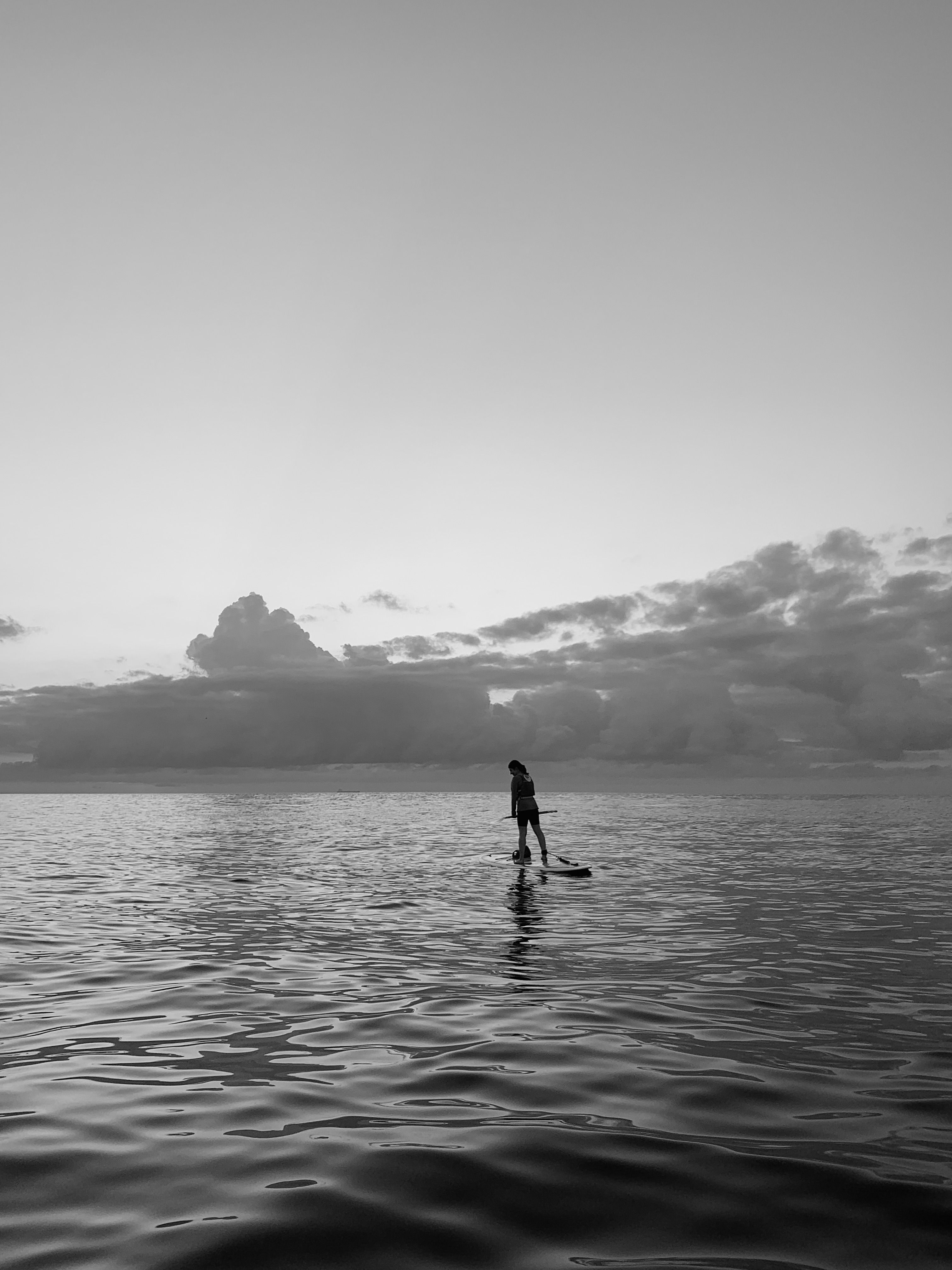 3024x4032 Person Standing on a Paddleboard · Free