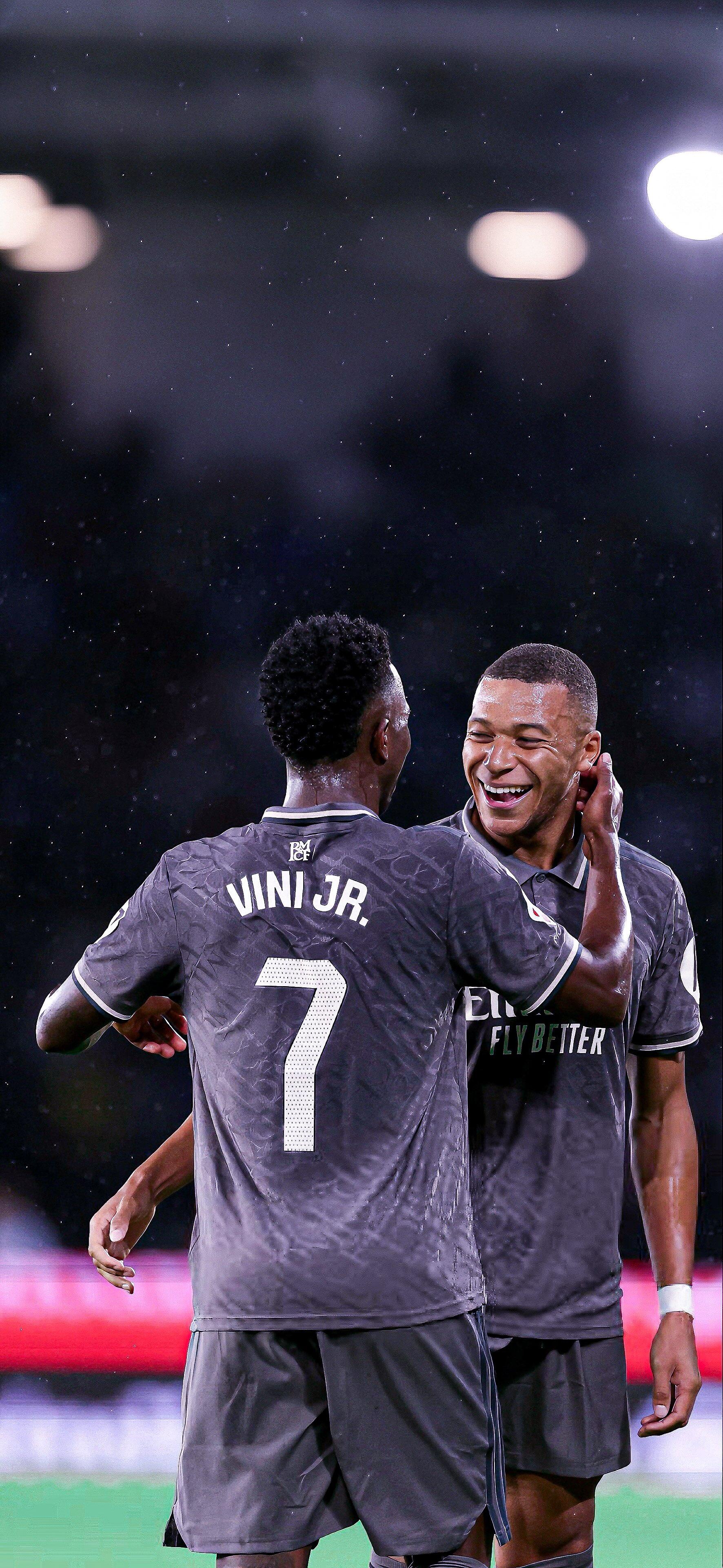 1772x3840 Dynamic Duo: Mbappé & Vinícius Júnior Soccer Wallpaper
