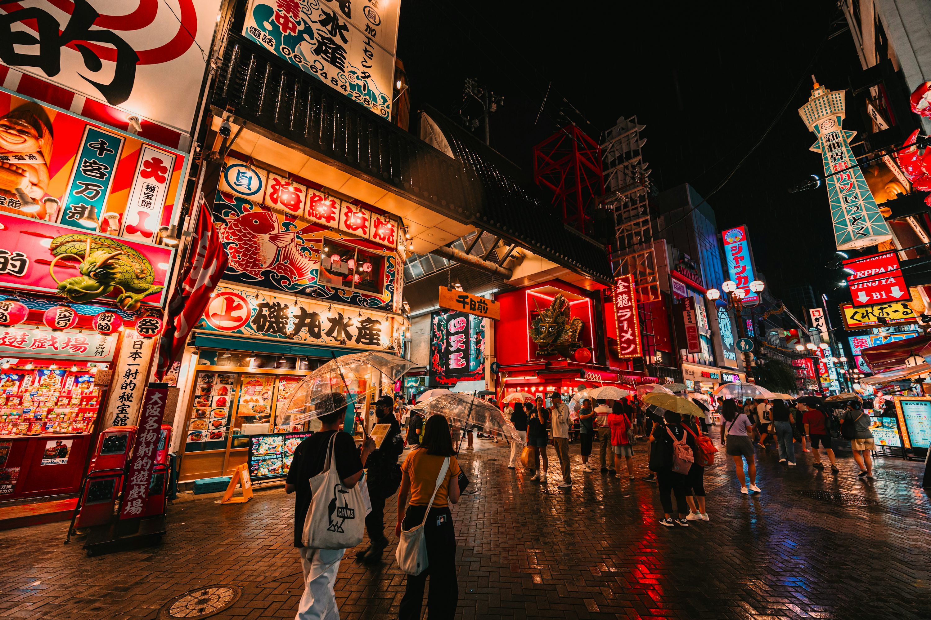 3000x2000 Crowded street in japan with neon signs at night photo