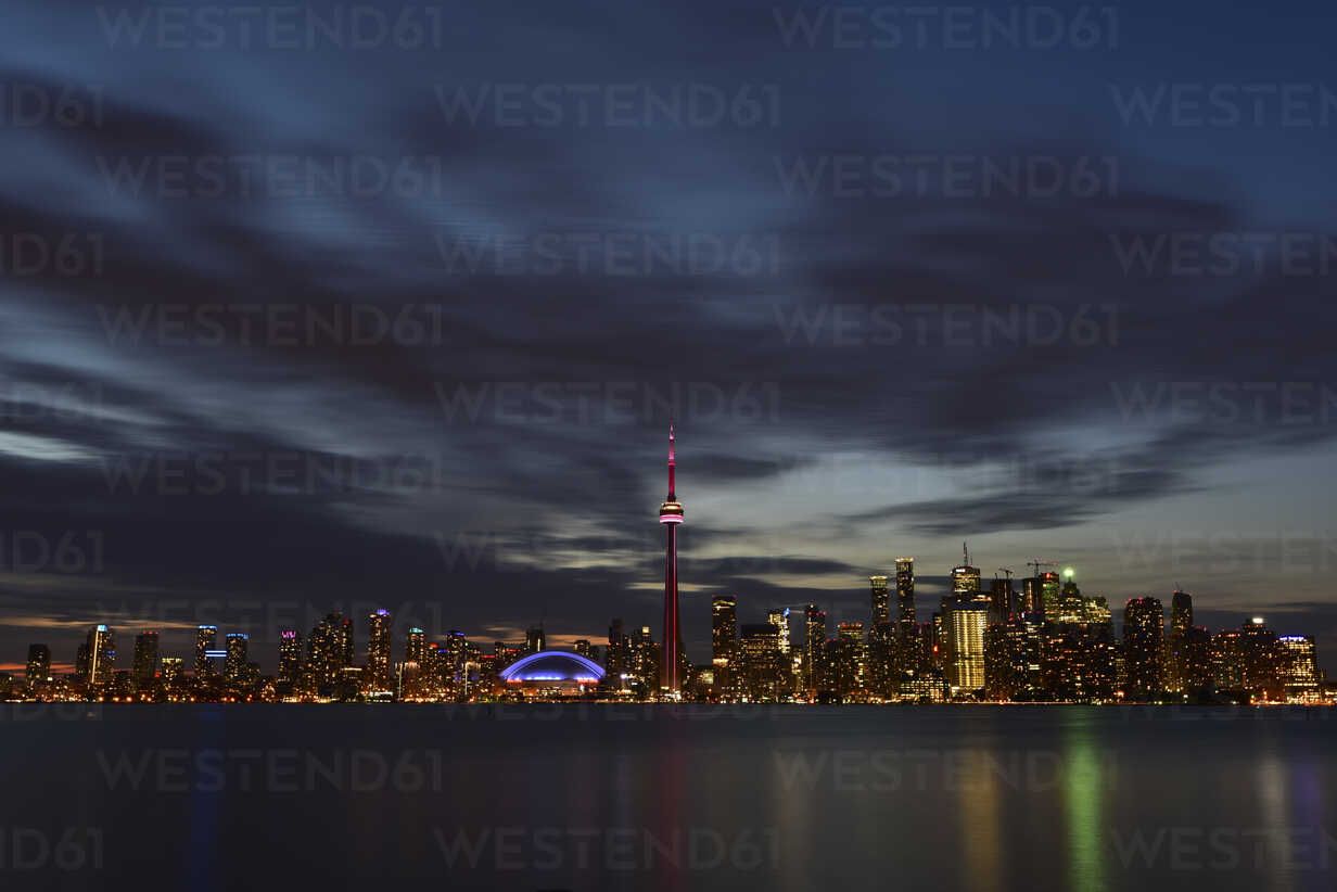1232x822 Canada, Ontario, Toronto, Skyline at night, moving clouds