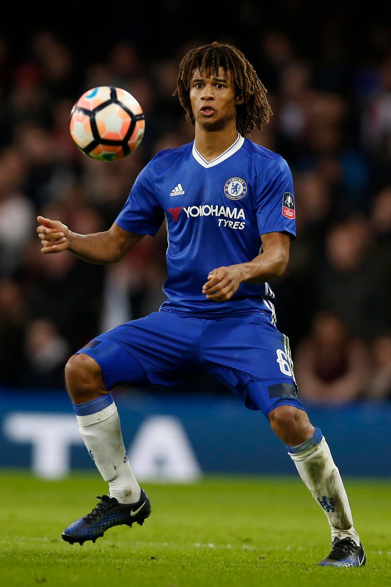 1281x1920 Download Nathan Ake Focusing On Football Wallpaper