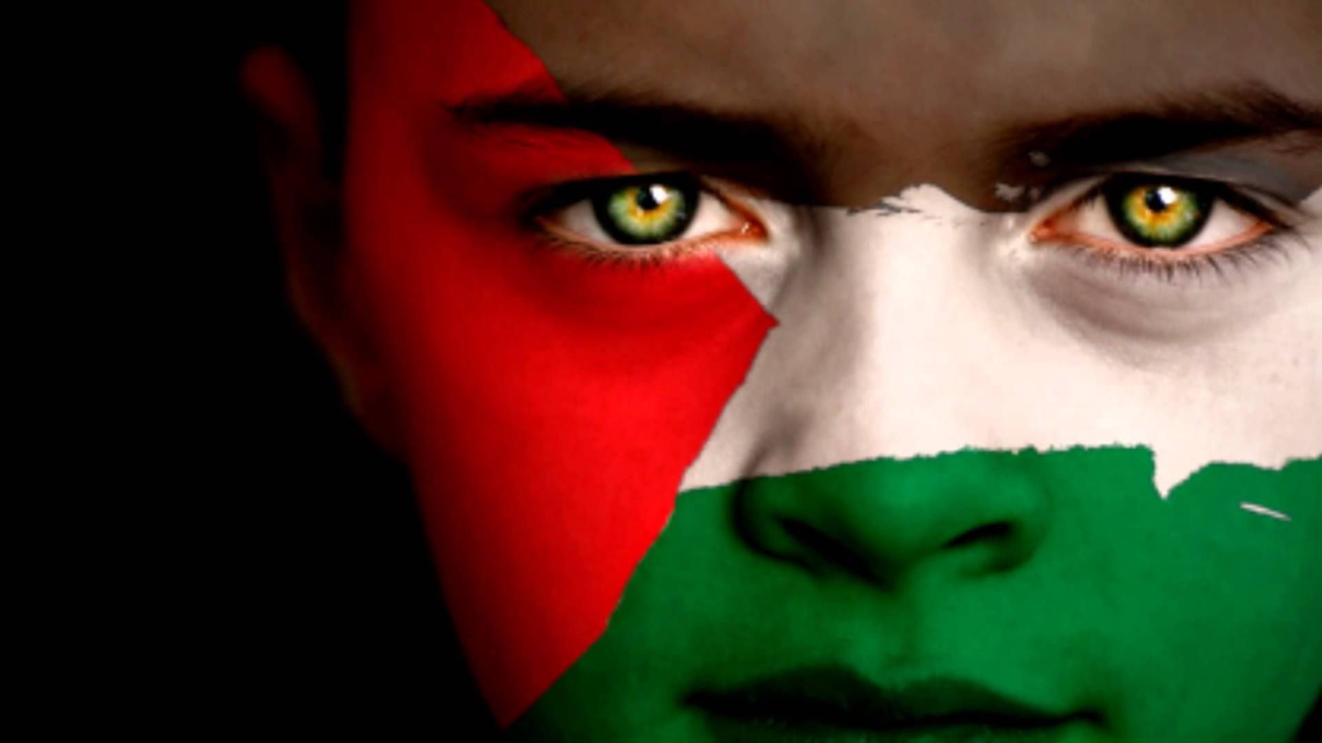 1920x1080 Download Passionate Supporter with Painted Palestine Flag on Face Wallpaper