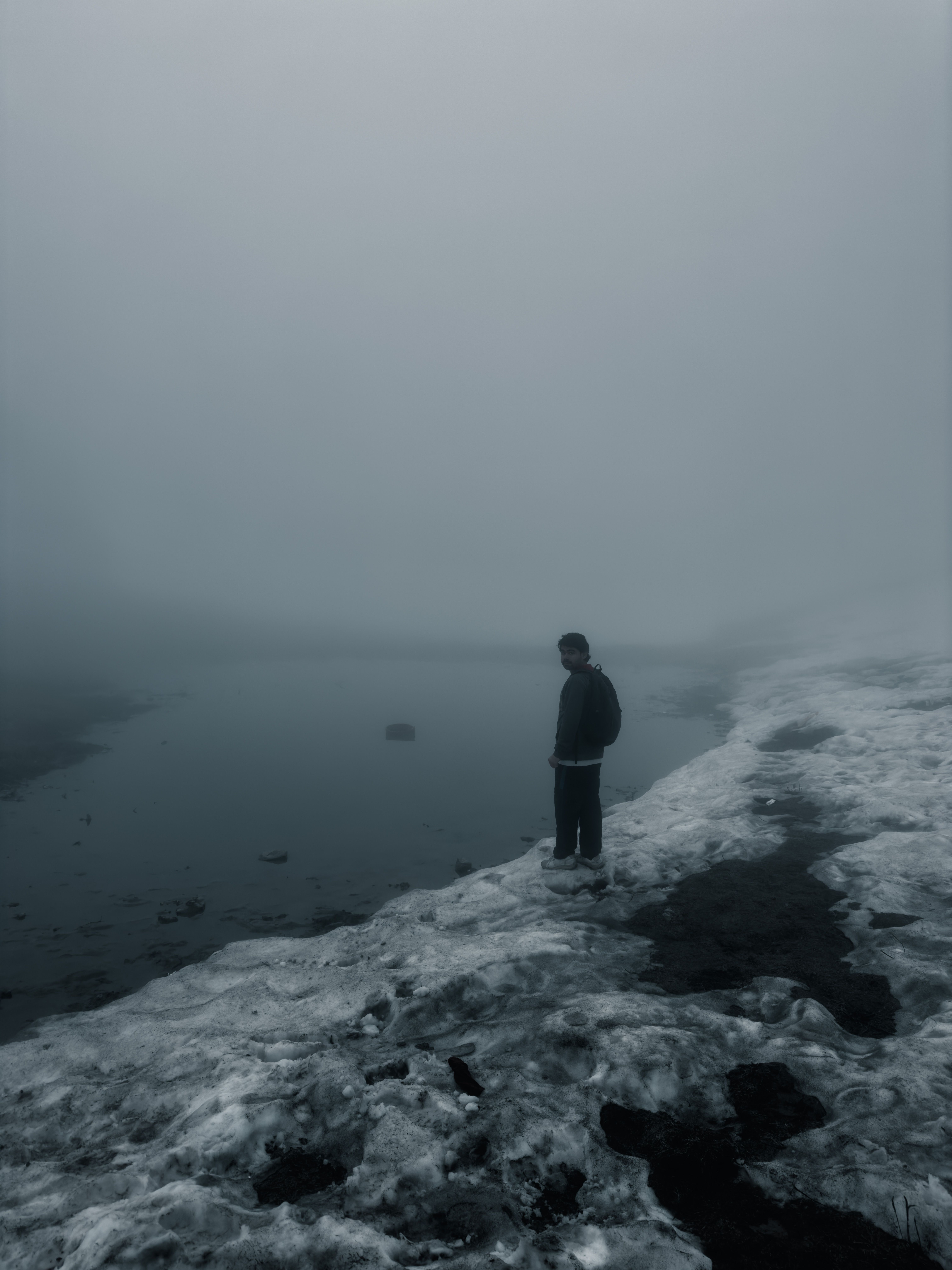 6048x8064 Hiker at the Lake on a Foggy Winter Day · Free