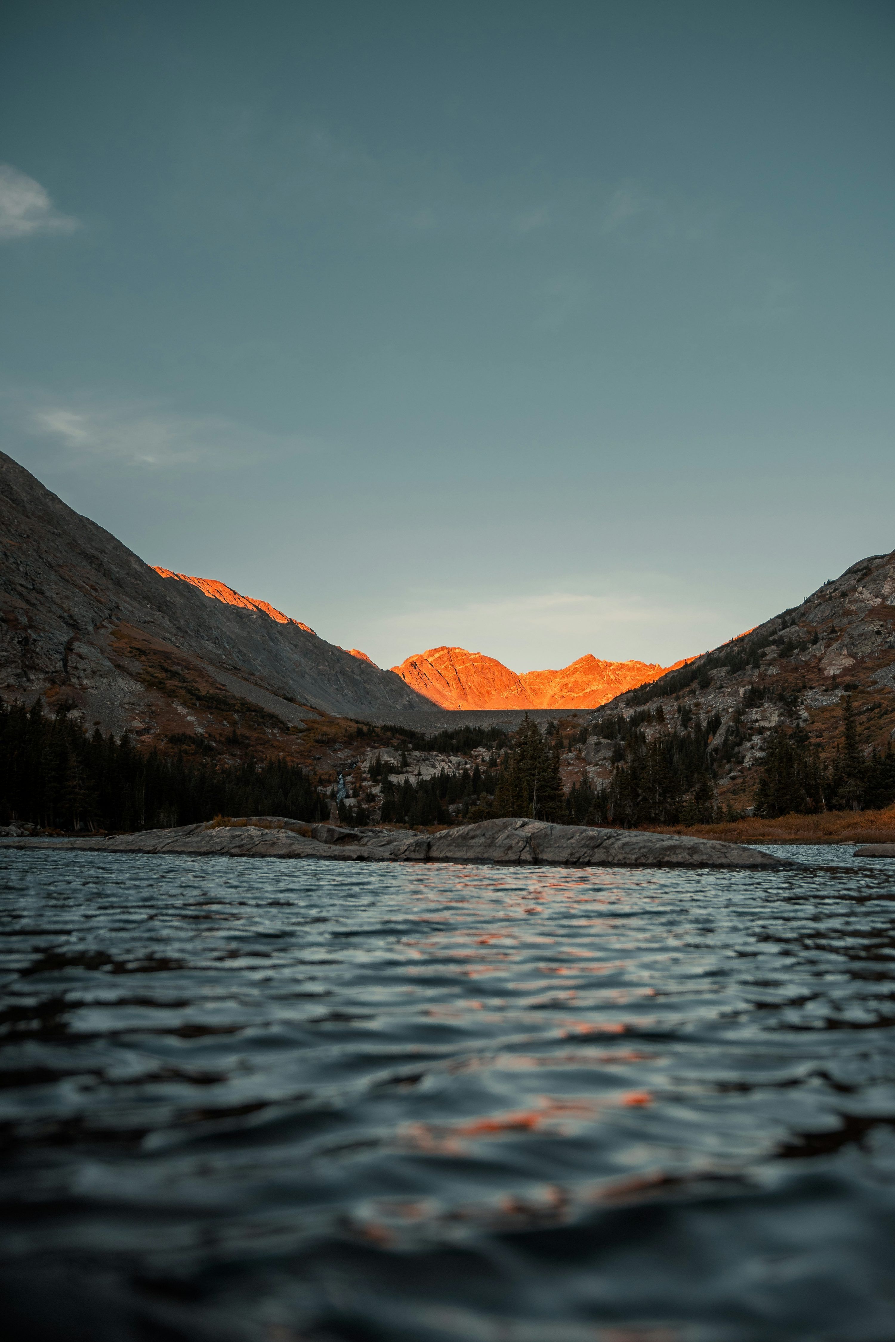 3000x4500 A lake with mountains in the background photo