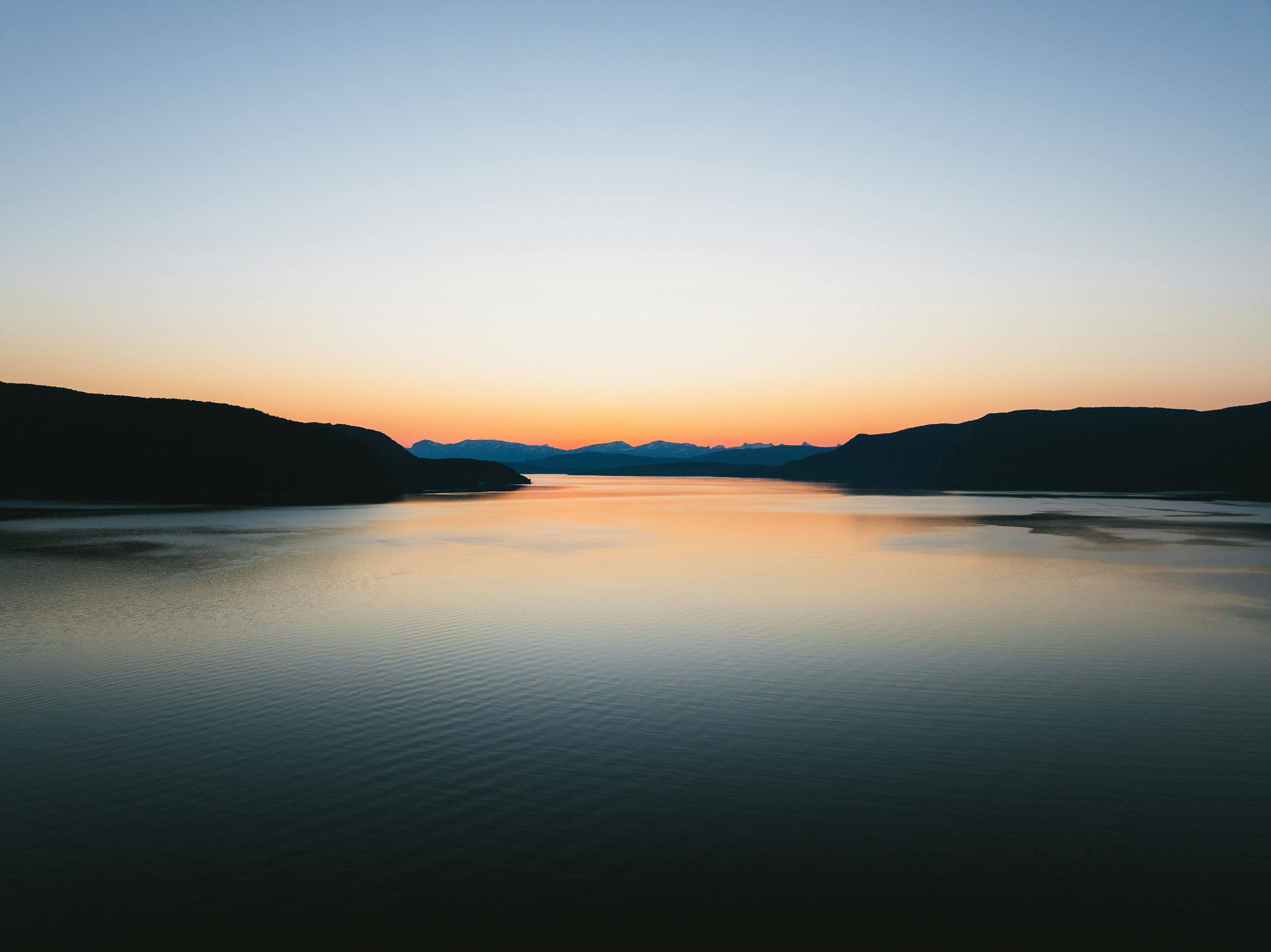 3000x2247 A beautiful sunset over a calm lake. photo