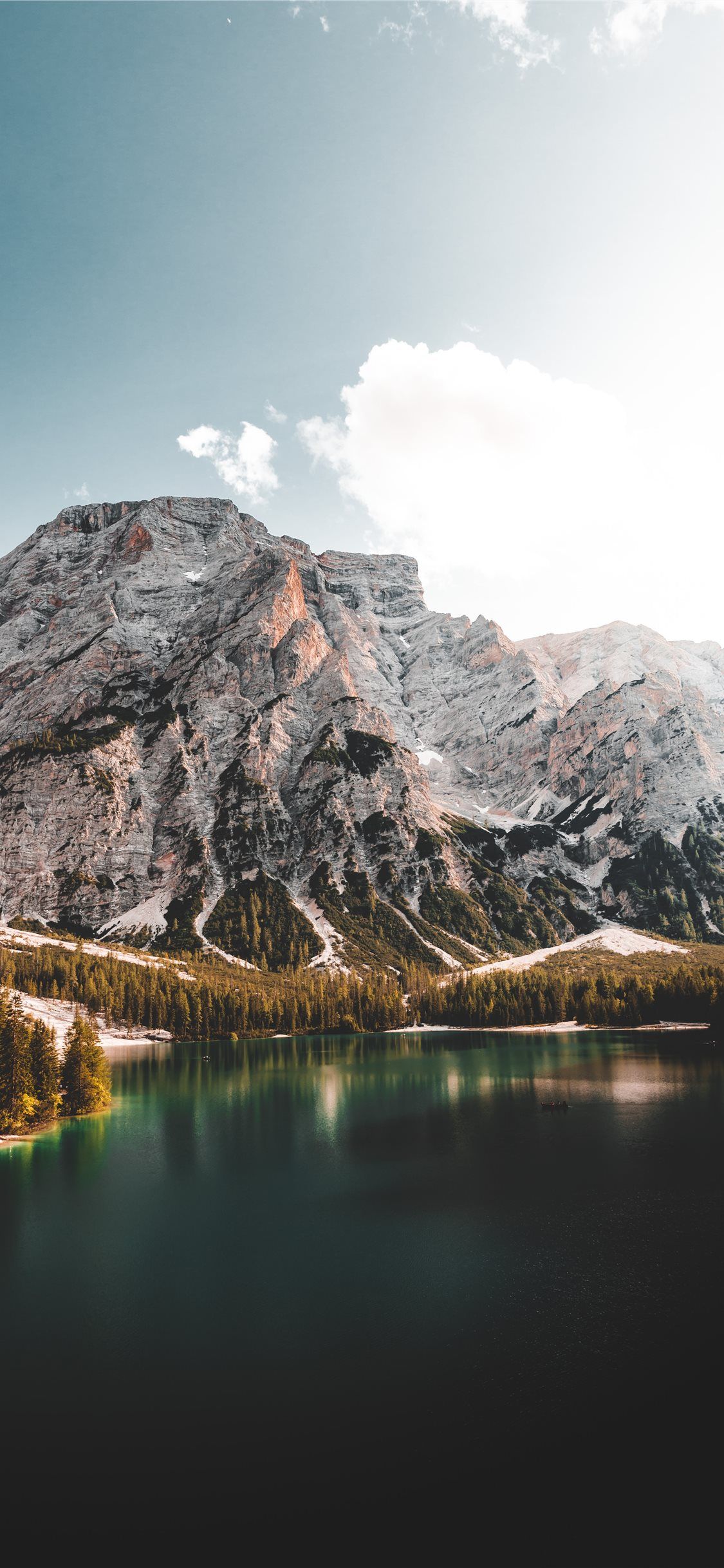 1125x2436 lake near mountain under blue sky during daytime iPhone X Wallpaper Free Download