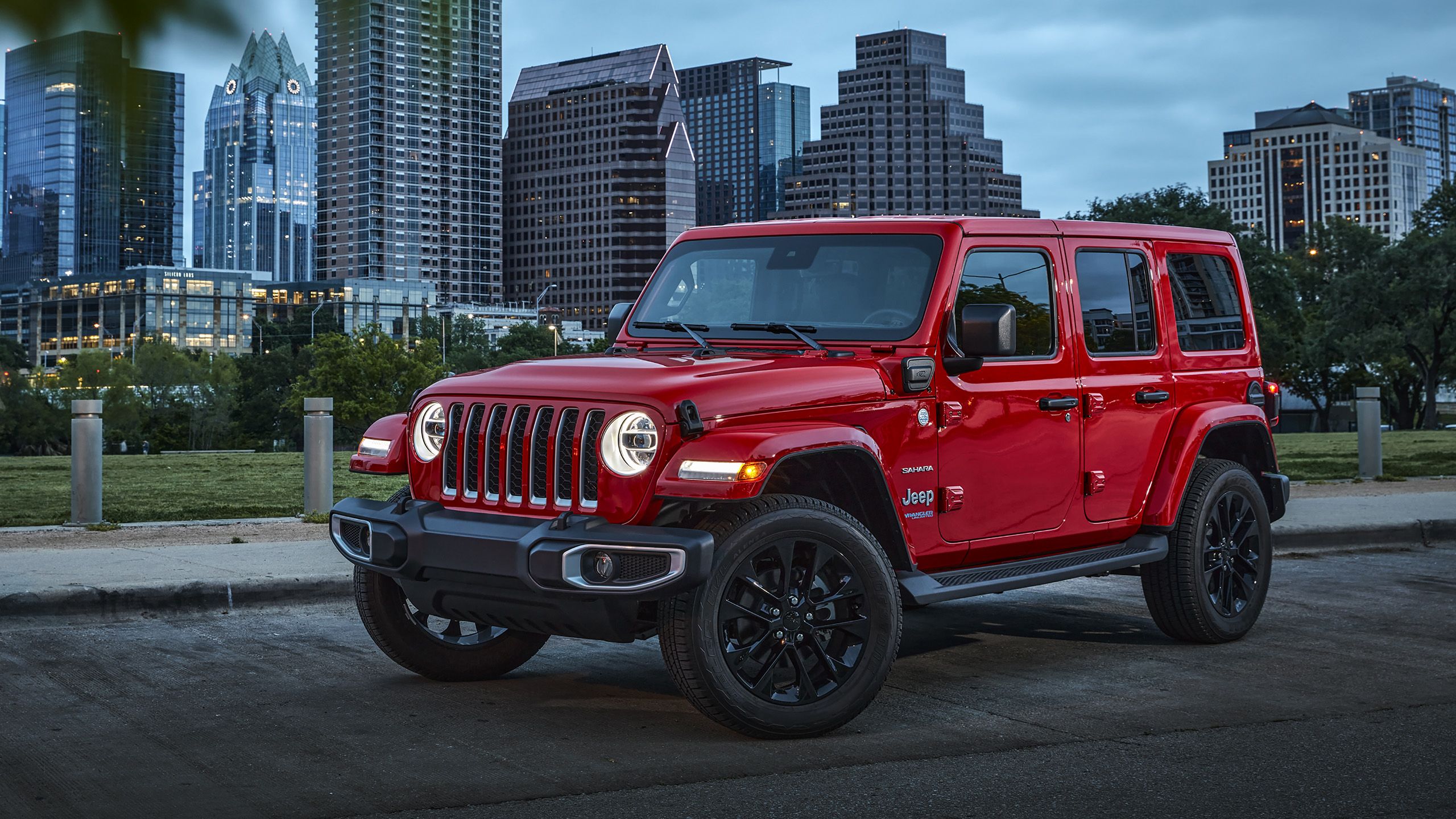 2560x1440 Jeep Wrangler Unlimited Sahara 4xe Wallpaper Car Wallpaper