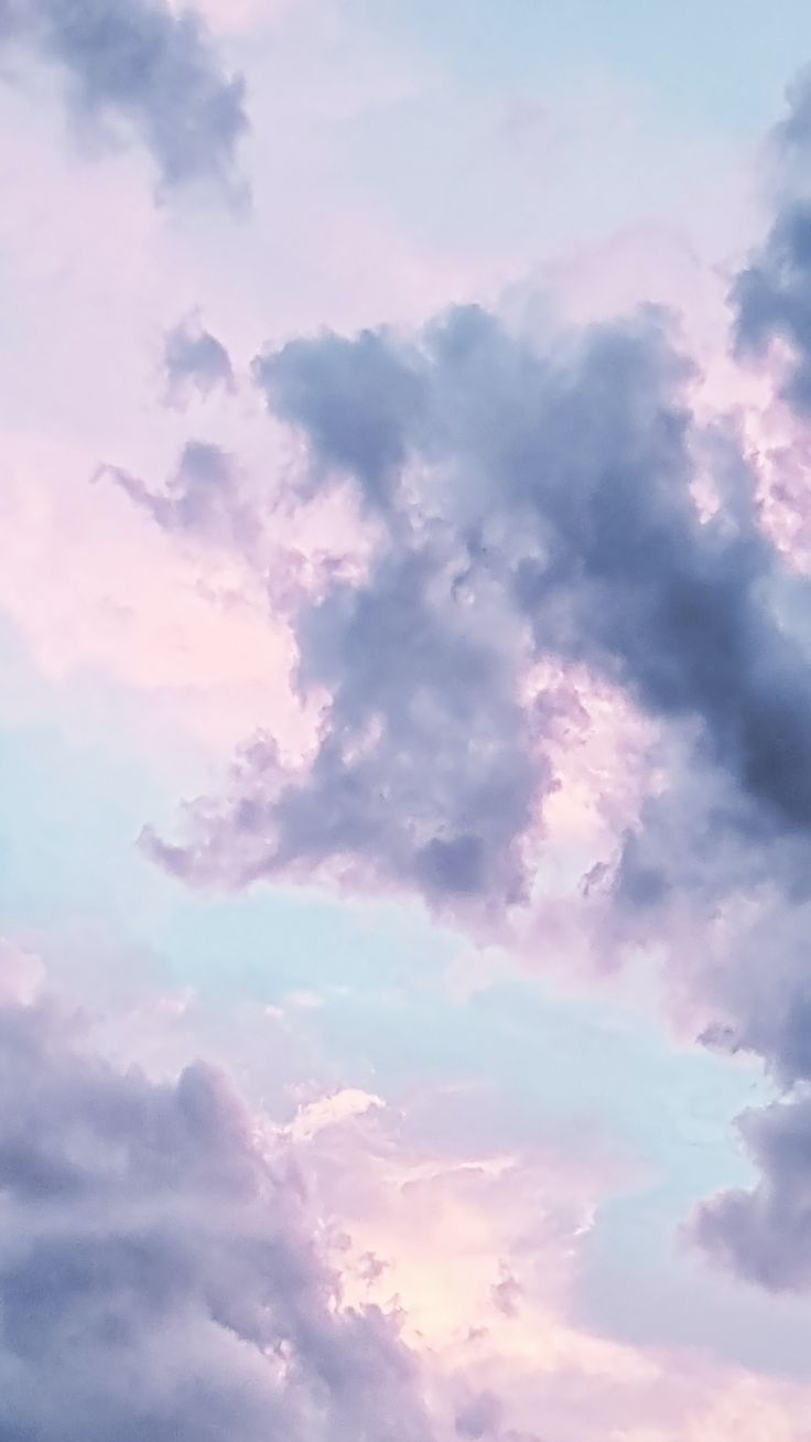 736x1308 Beautiful Pink, Blue and Purple Clouds Wallpaper With Sunlight