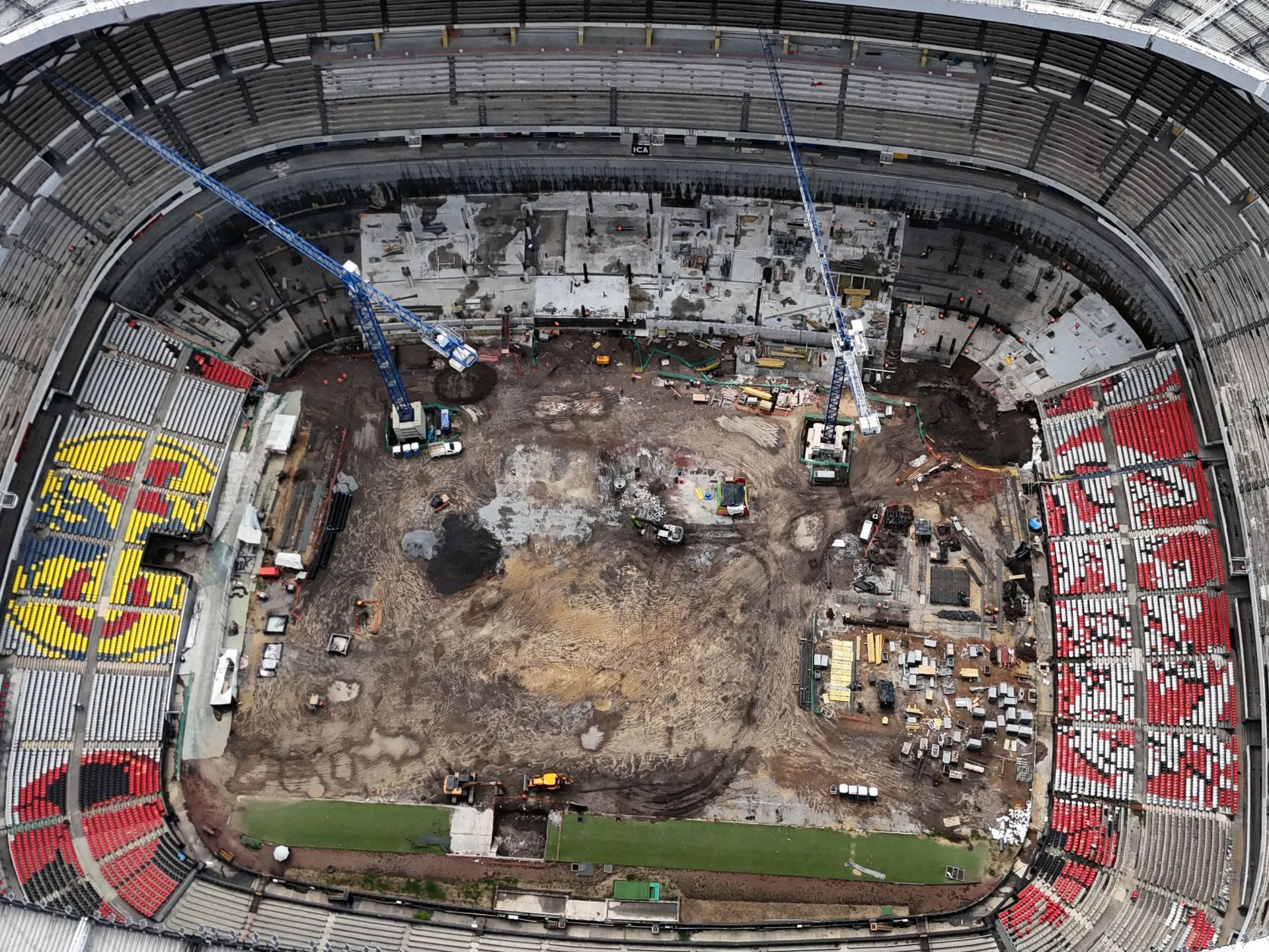 1920x1440 World Cup stadium looks totally unrecognisable with cranes on pitch and seats ripped out