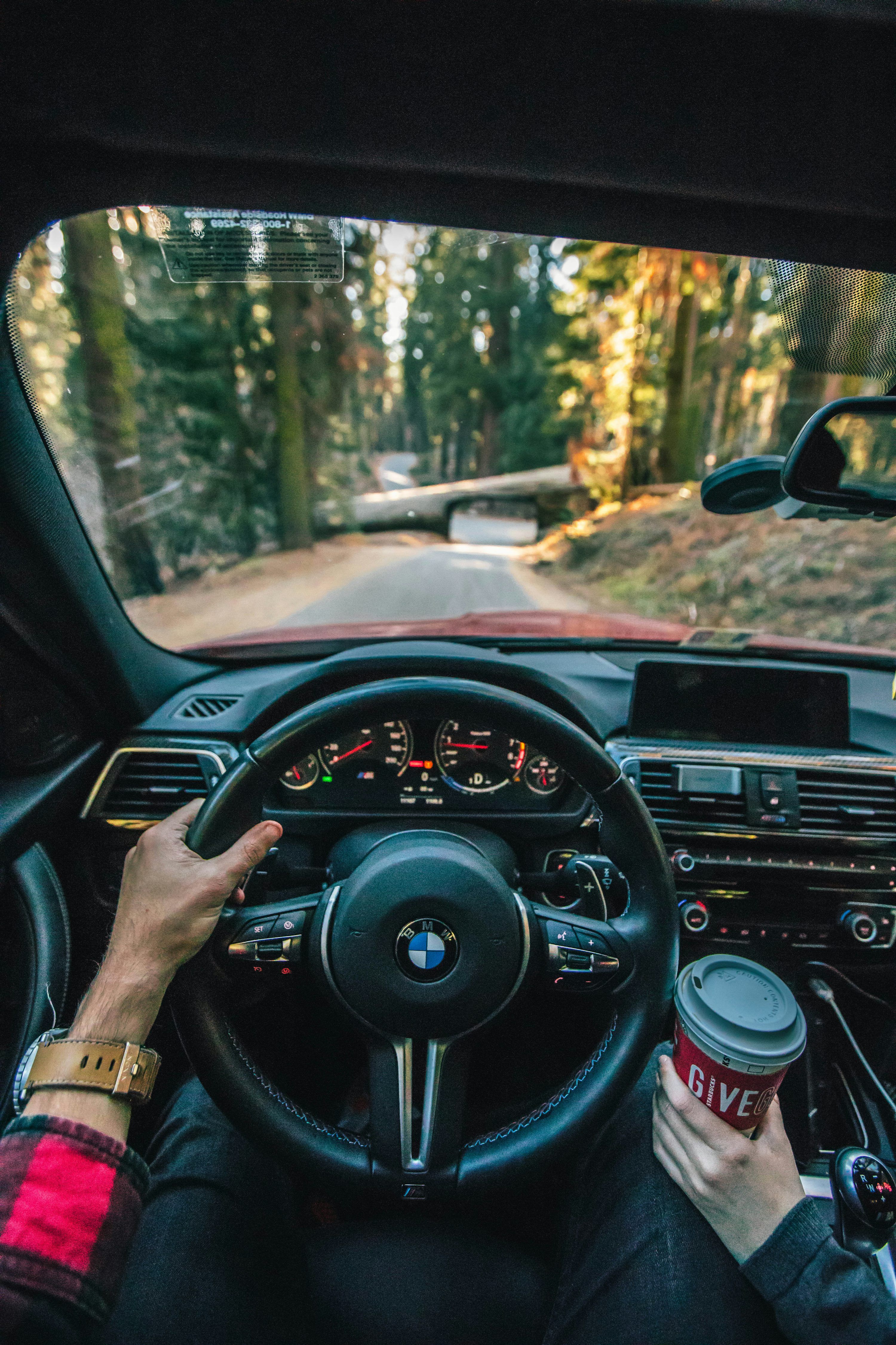 3000x4500 Black BMW steering wheel photo