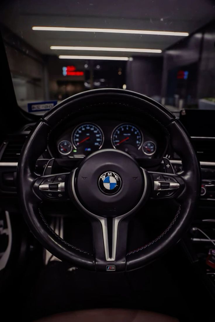 736x1104 BMW M4 dash/ steering wheel